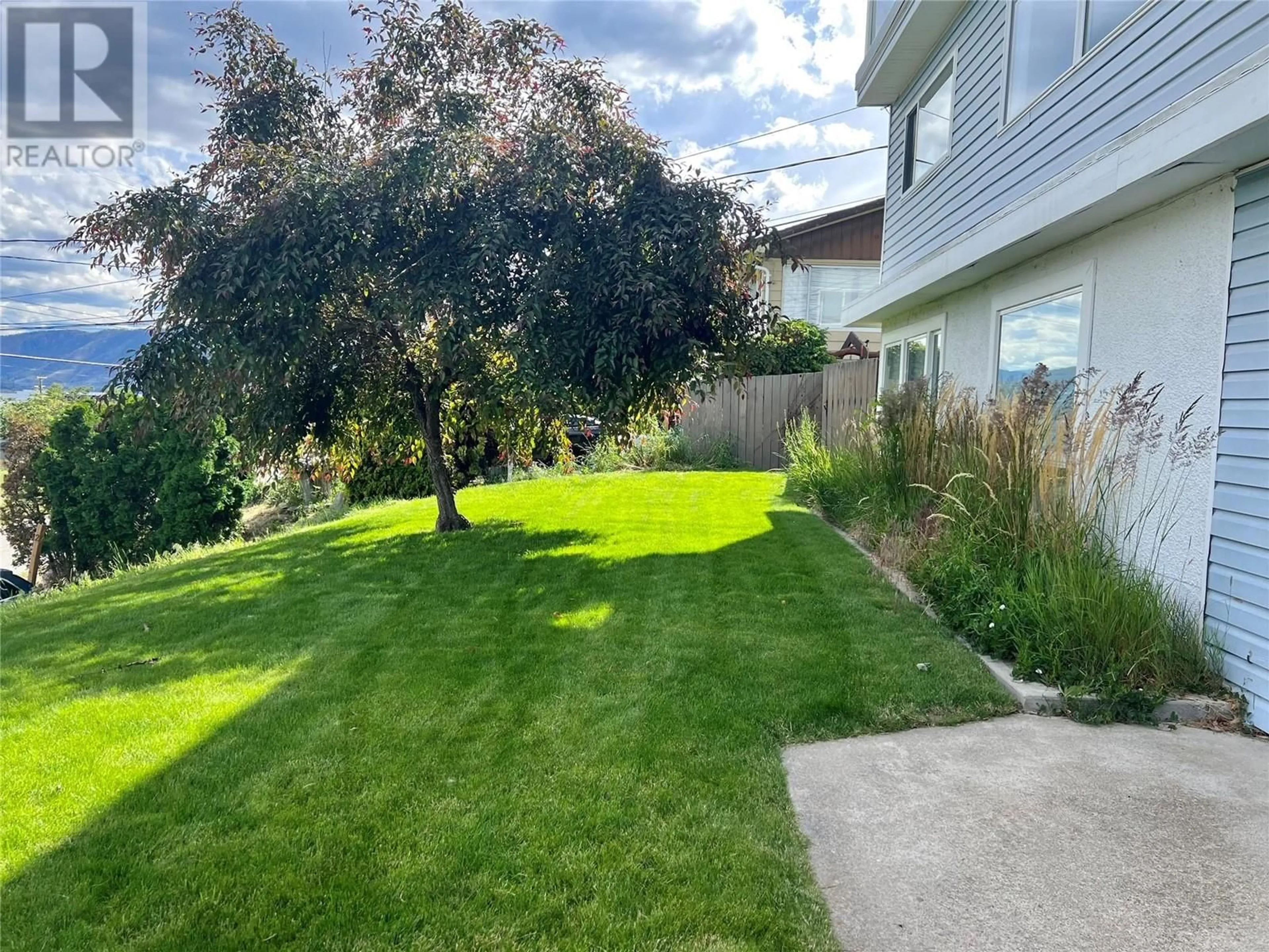 Frontside or backside of a home, the fenced backyard for 5262 Huston Road Lot# 4, Peachland British Columbia V0H1X2