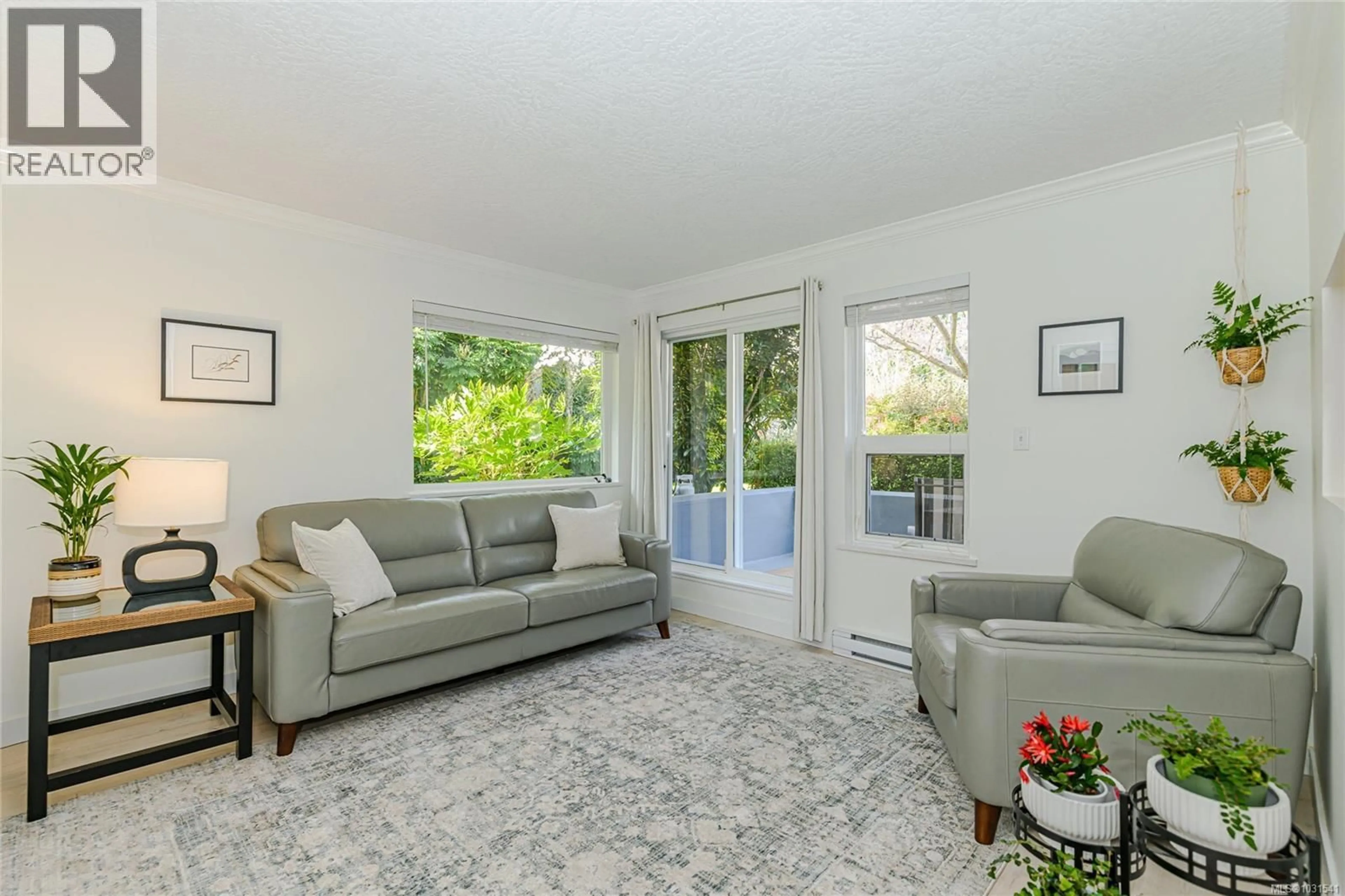 Living room with furniture, unknown for 103 - 3180 ALBINA STREET, Saanich British Columbia V9A1Z5