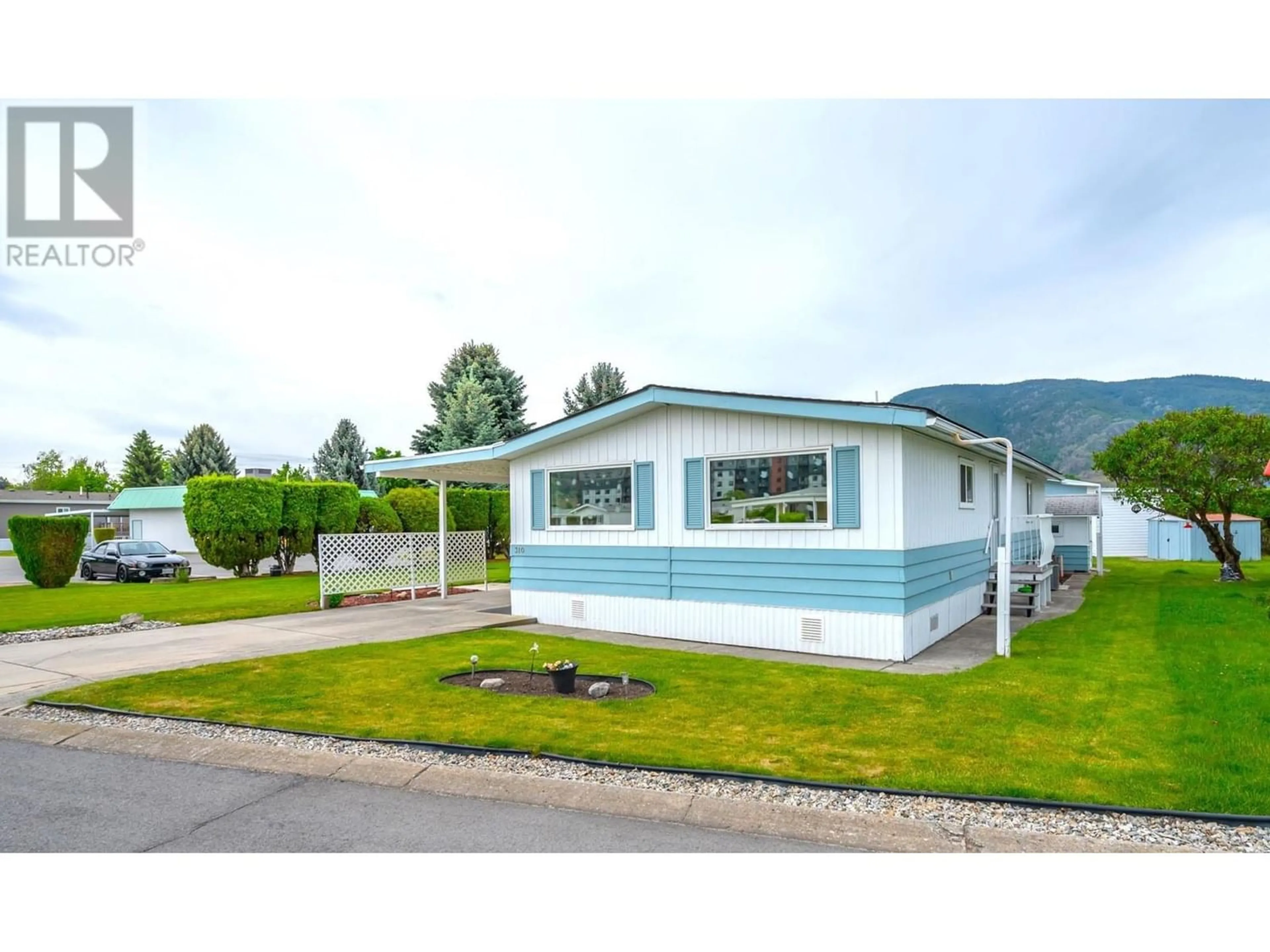 Home with vinyl exterior material for 321 Yorkton Avenue Unit# 310, Penticton British Columbia V2A3V6