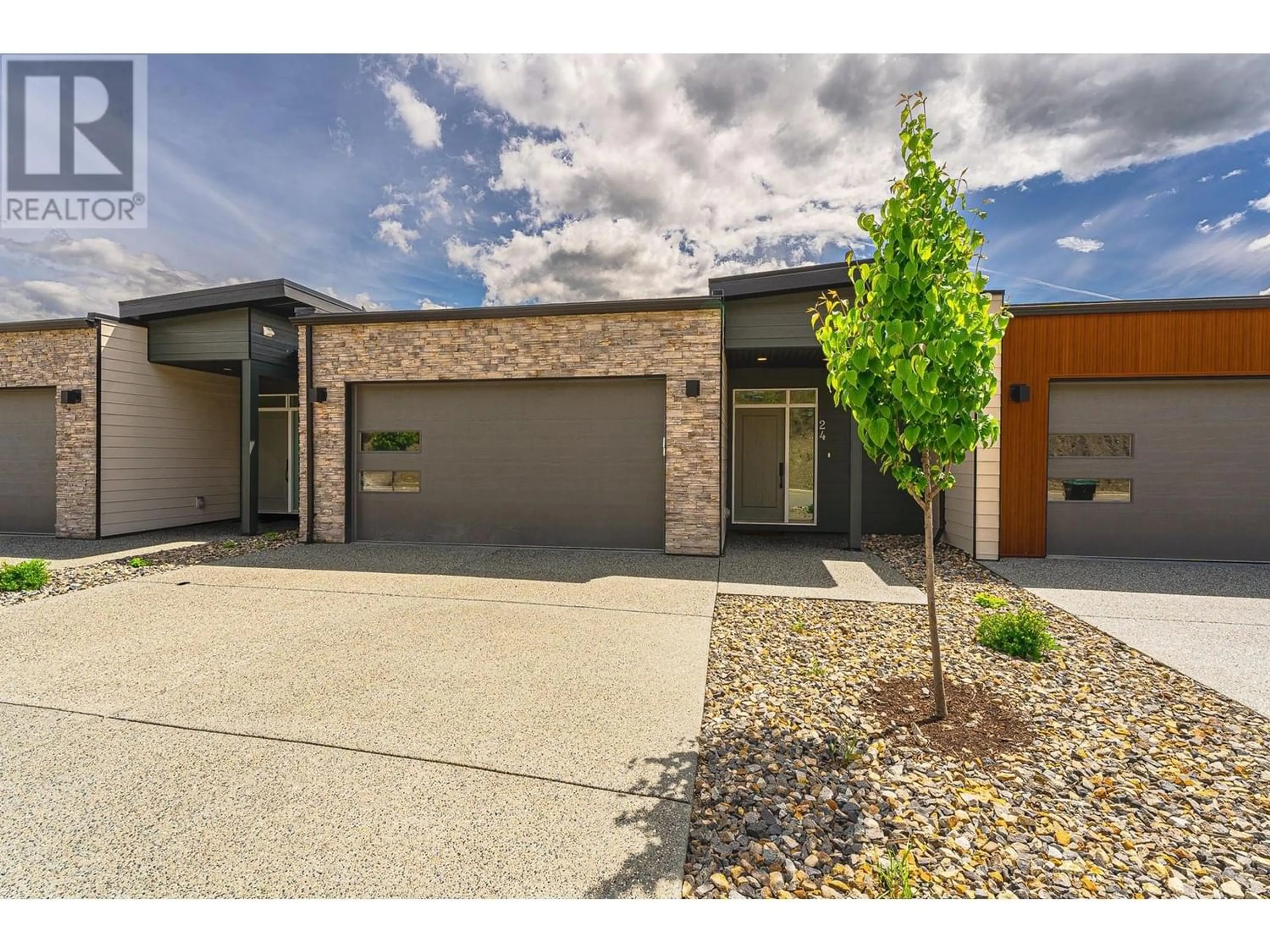 Home with brick exterior material for 7735 OKANAGAN HILLS Boulevard Unit# 24, Vernon British Columbia V1H1Z9