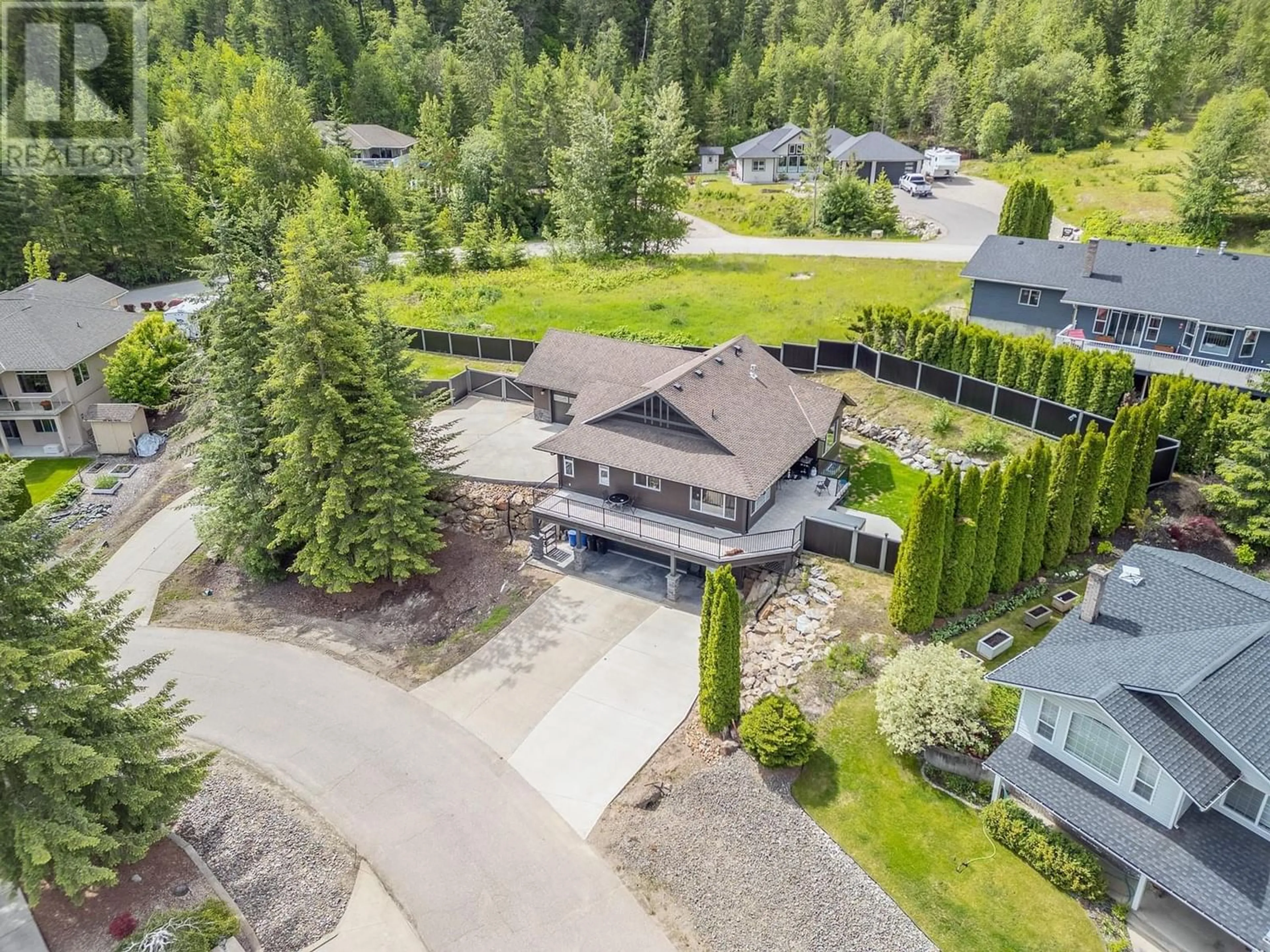 Frontside or backside of a home, the fenced backyard for 2593 GLENMOUNT Place, Blind Bay British Columbia V0E1H1