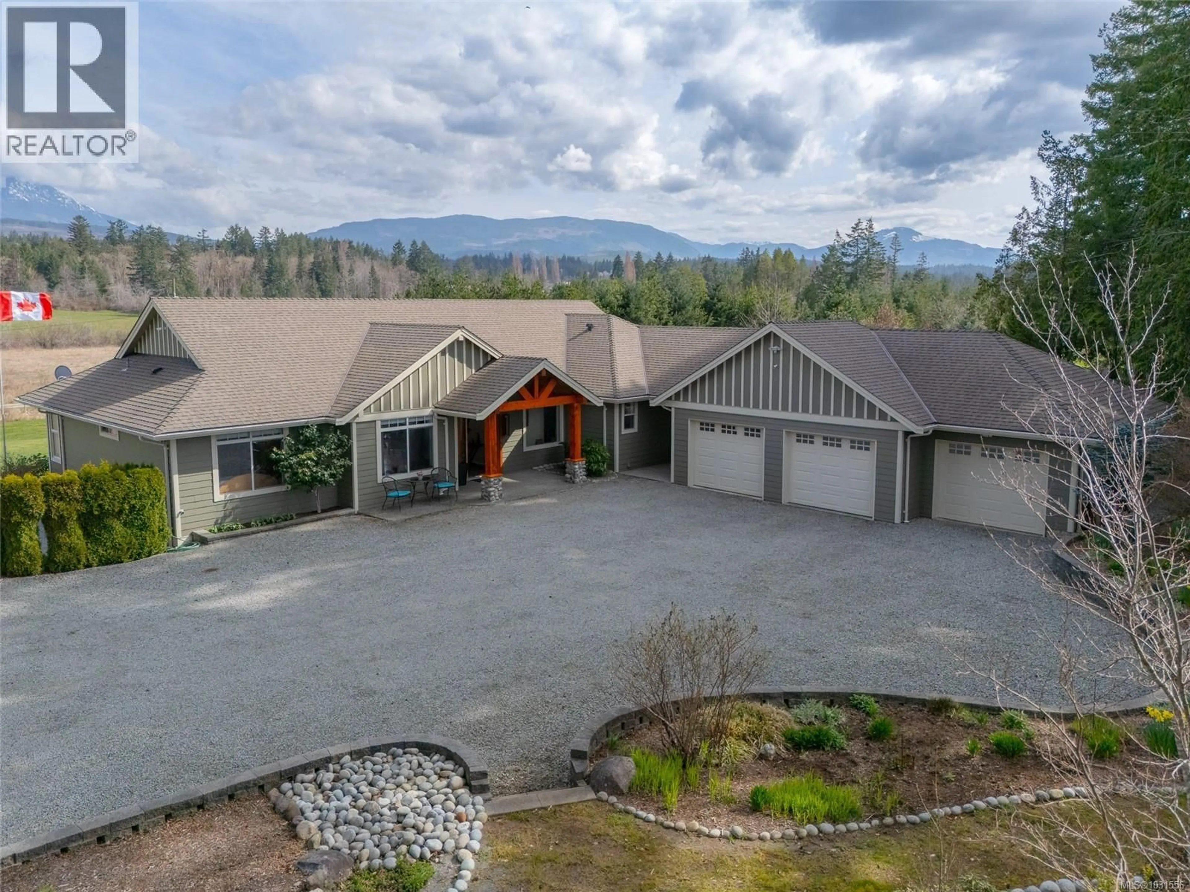 A pic from outside/outdoor area/front of a property/back of a property/a pic from drone, mountain view for 3170 MOZART ROAD, Port Alberni British Columbia V9Y8R2