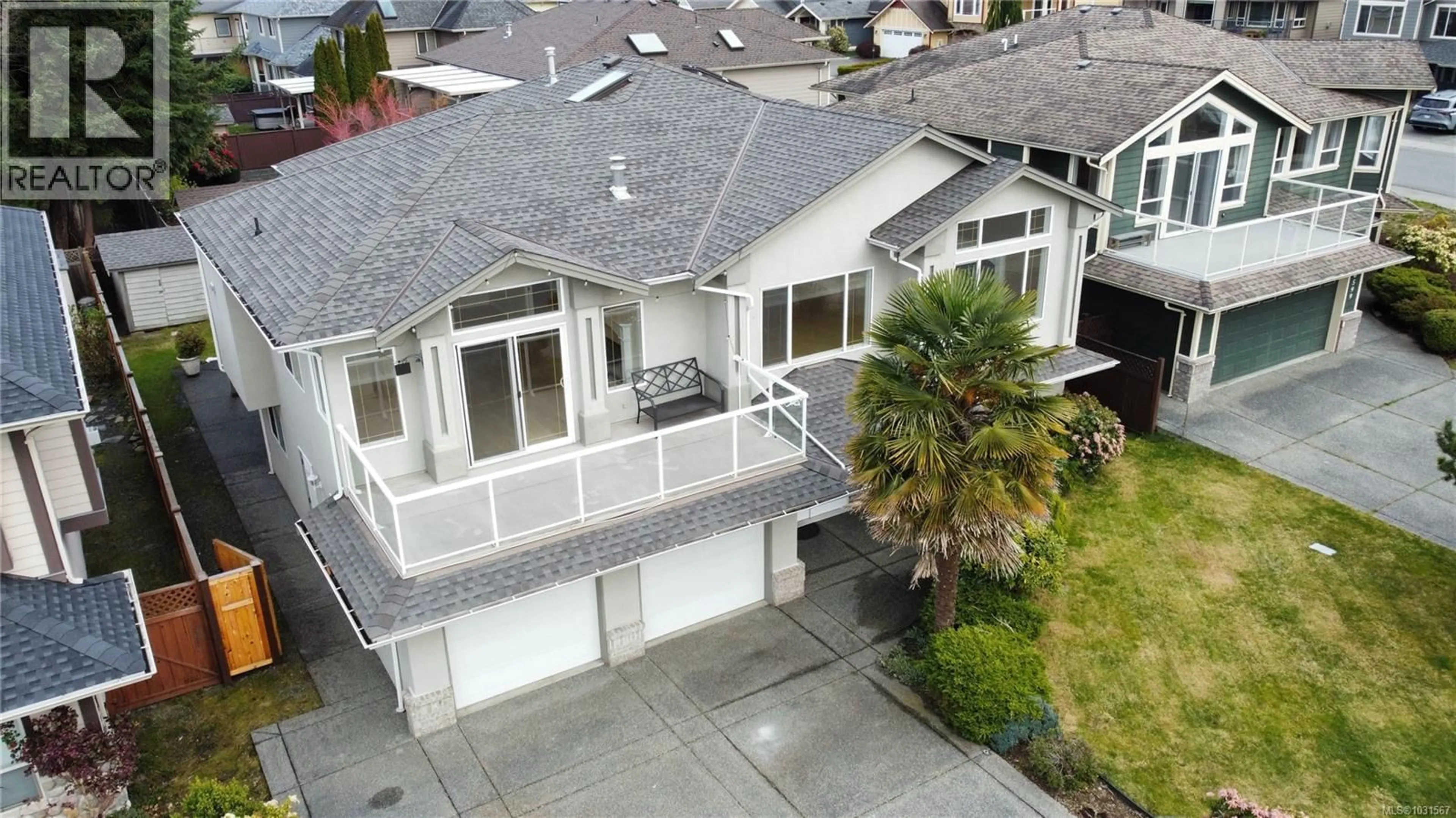 A pic from outside/outdoor area/front of a property/back of a property/a pic from drone, street for 6593 KESTREL CRESCENT, Nanaimo British Columbia V9V1V9