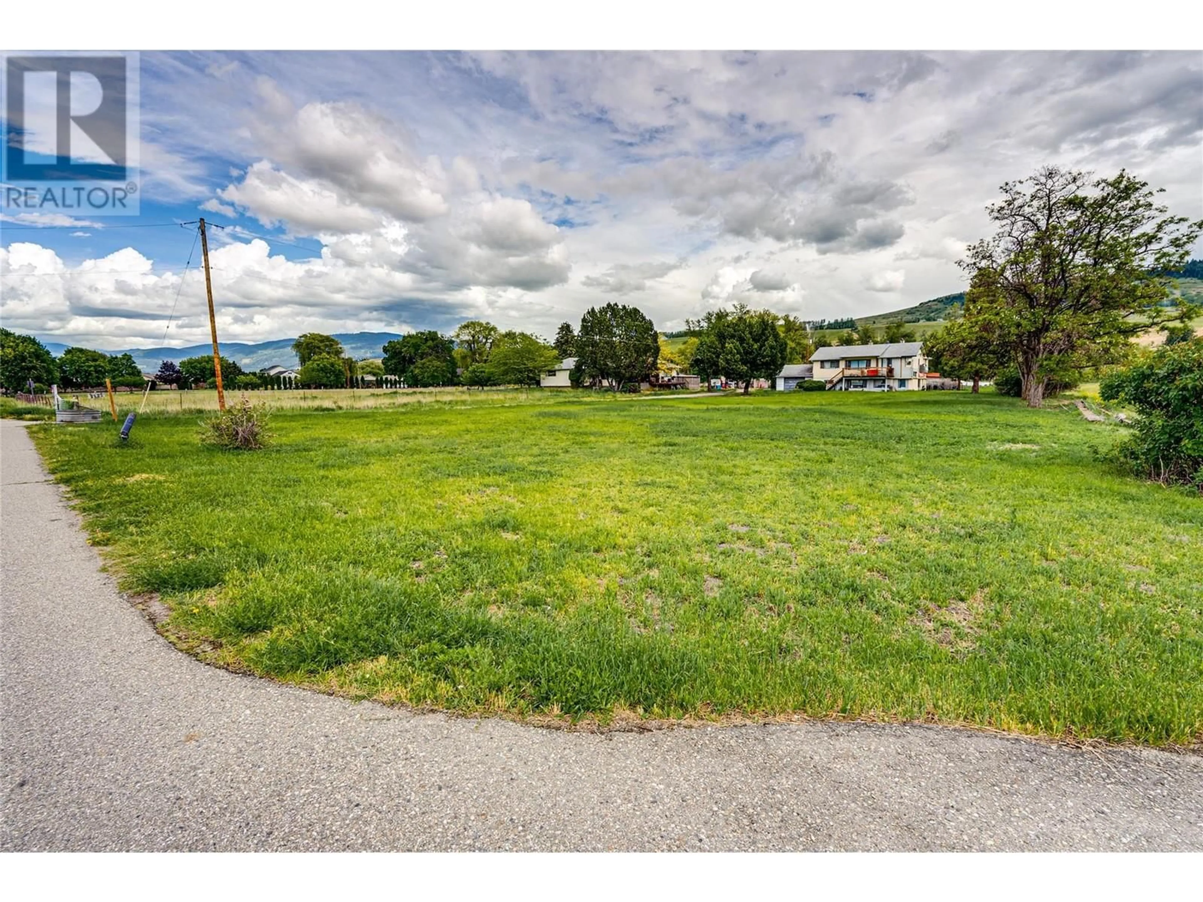 A pic from outside/outdoor area/front of a property/back of a property/a pic from drone, unknown for 6060 OKANAGAN LANDING ROAD, Vernon British Columbia V1H1M3