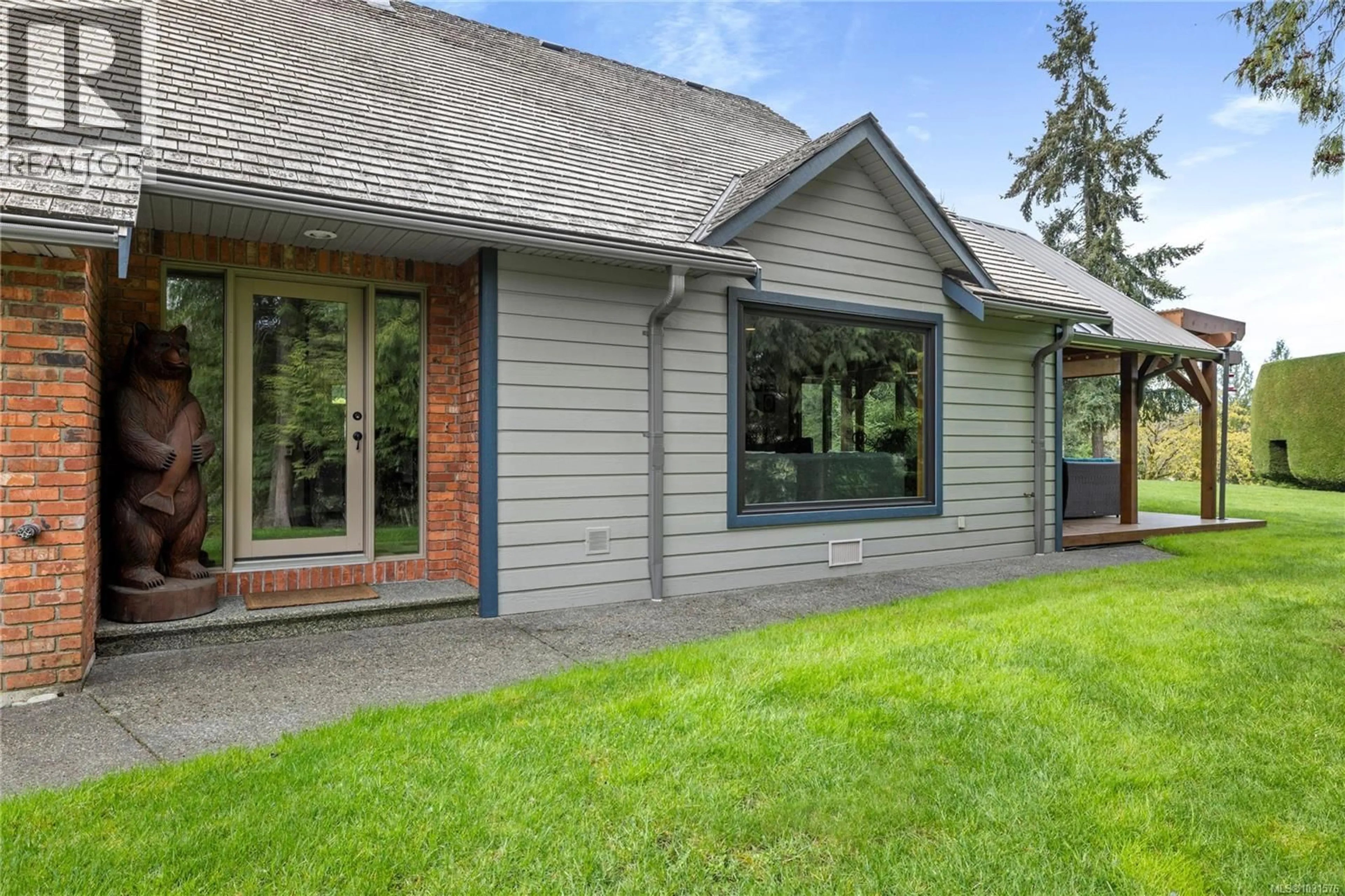 Home with vinyl exterior material, street for 1204 BAZETT ROAD, Duncan British Columbia V9L5S8