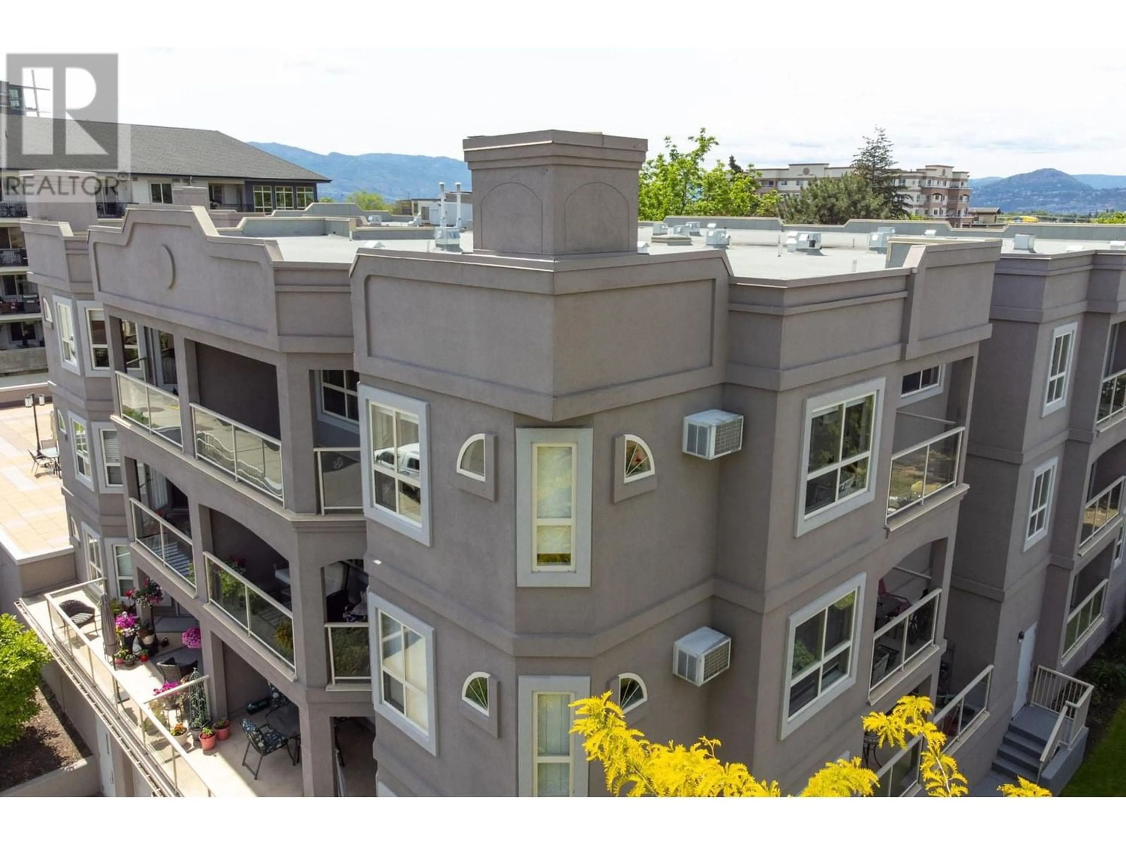 A pic from exterior of the house or condo, the front or back of building for 2130 Vasile Road Unit# 307, Kelowna British Columbia V1Y6H5