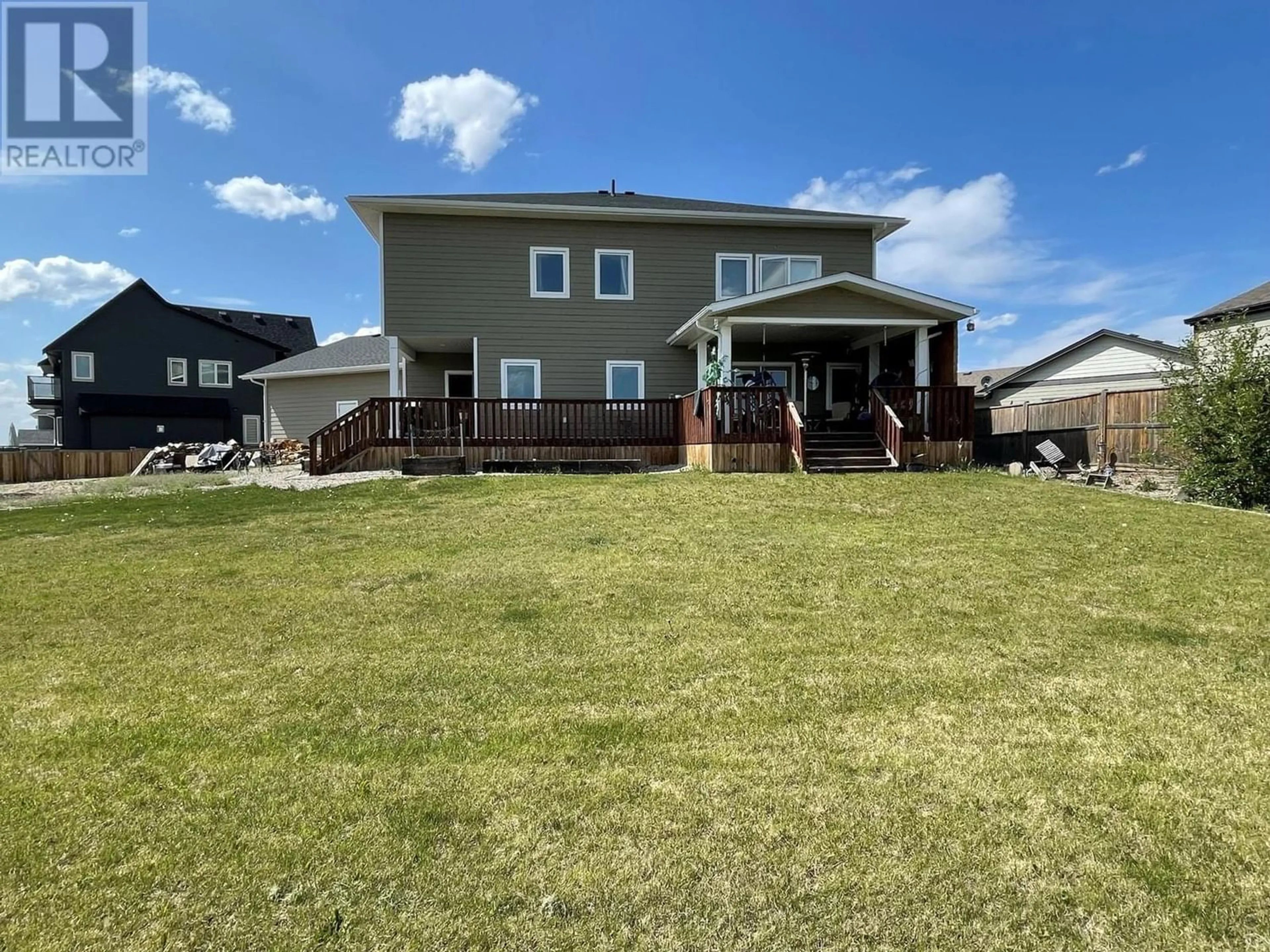 A pic from outside/outdoor area/front of a property/back of a property/a pic from drone, unknown for 805 89 Avenue, Dawson Creek British Columbia V1G0A8