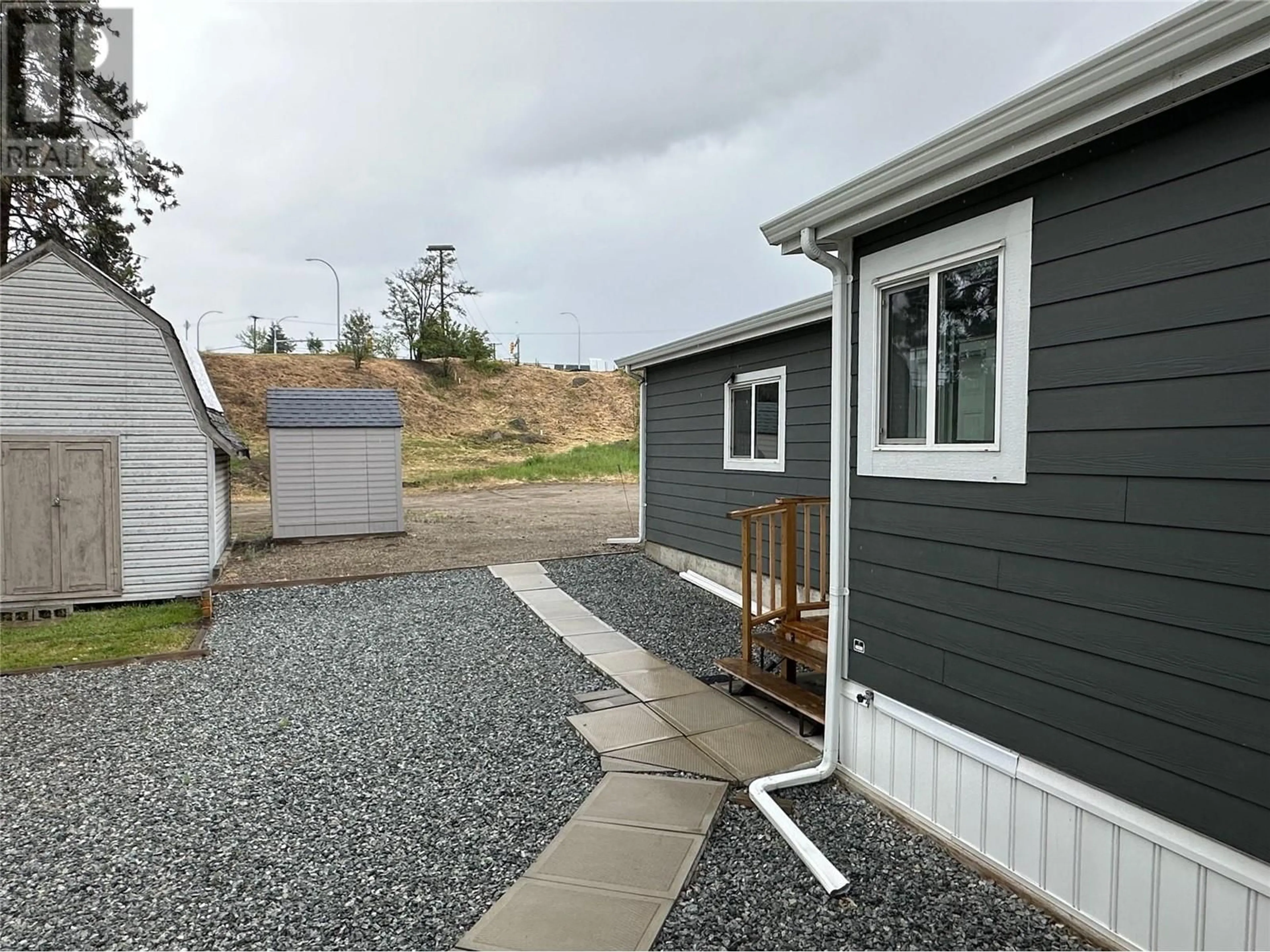 Home with vinyl exterior material, street for 8 - 4701 PLEASANT VALLEY DRIVE ROAD, Vernon British Columbia V1T4M7