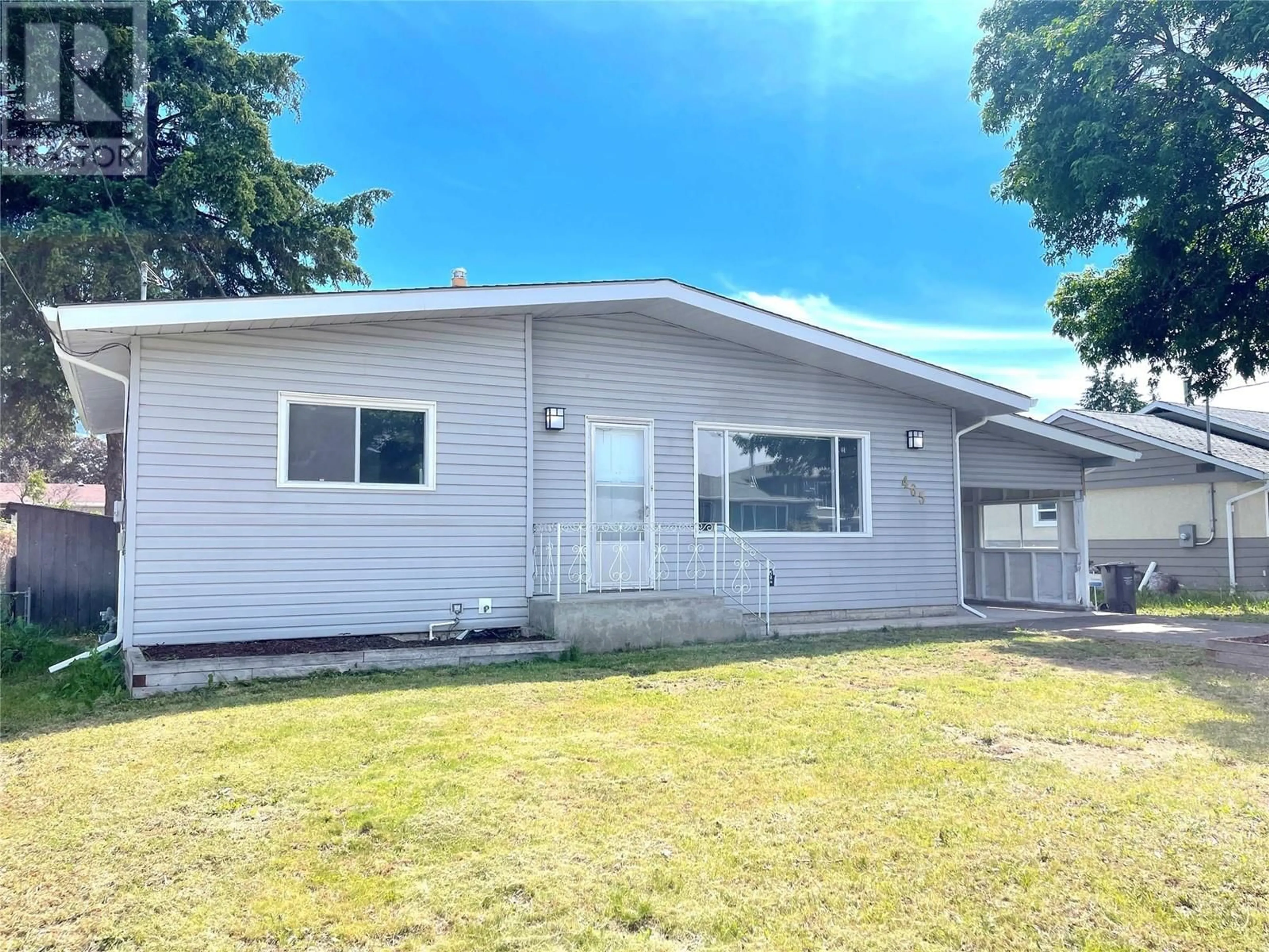 Home with vinyl exterior material, street for 465 DONHAUSER ROAD, Kelowna British Columbia V1X3G2
