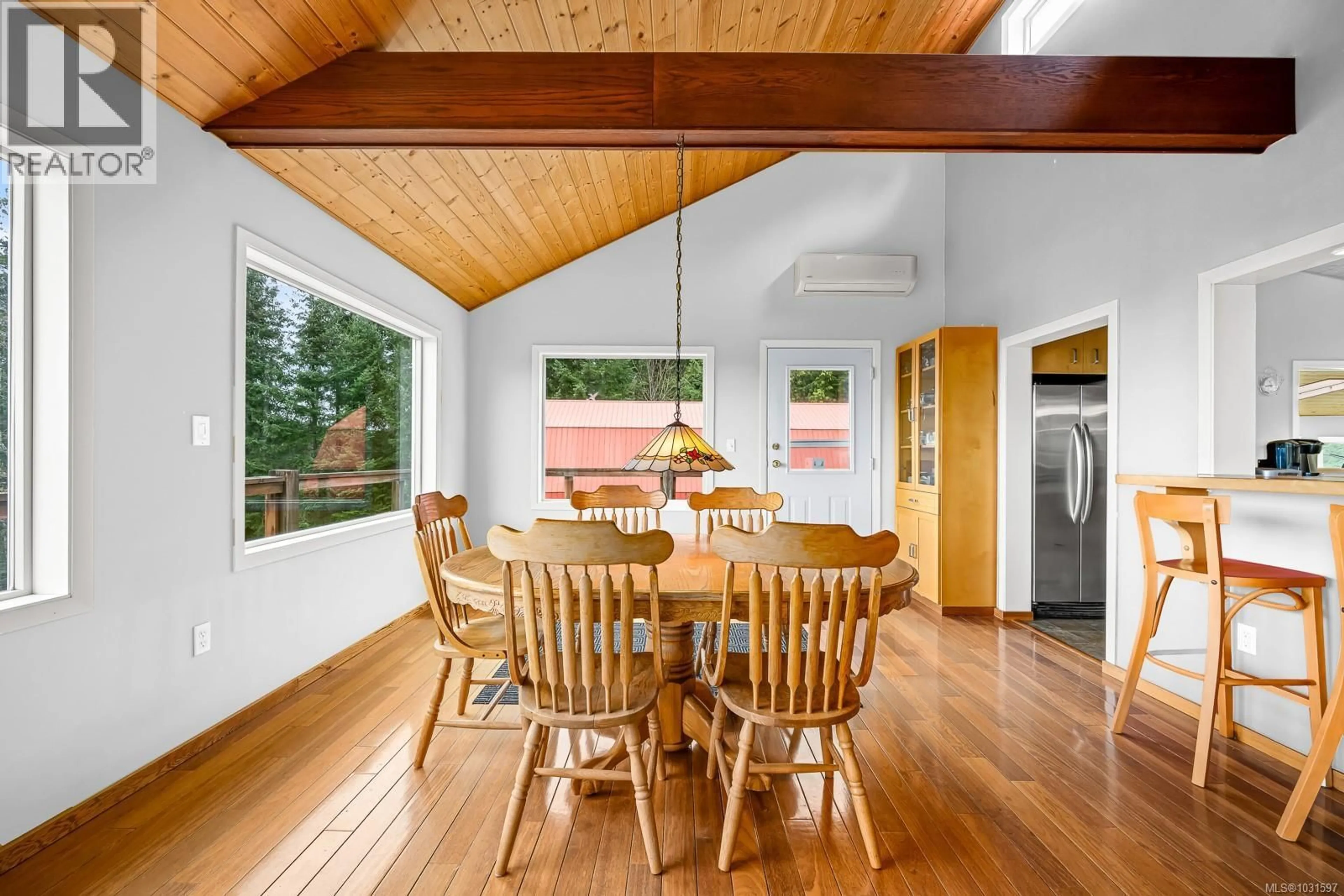 Dining room, wood/laminate floor for 8900 KEITH WAGNER WAY, Denman Island British Columbia V0R1T0