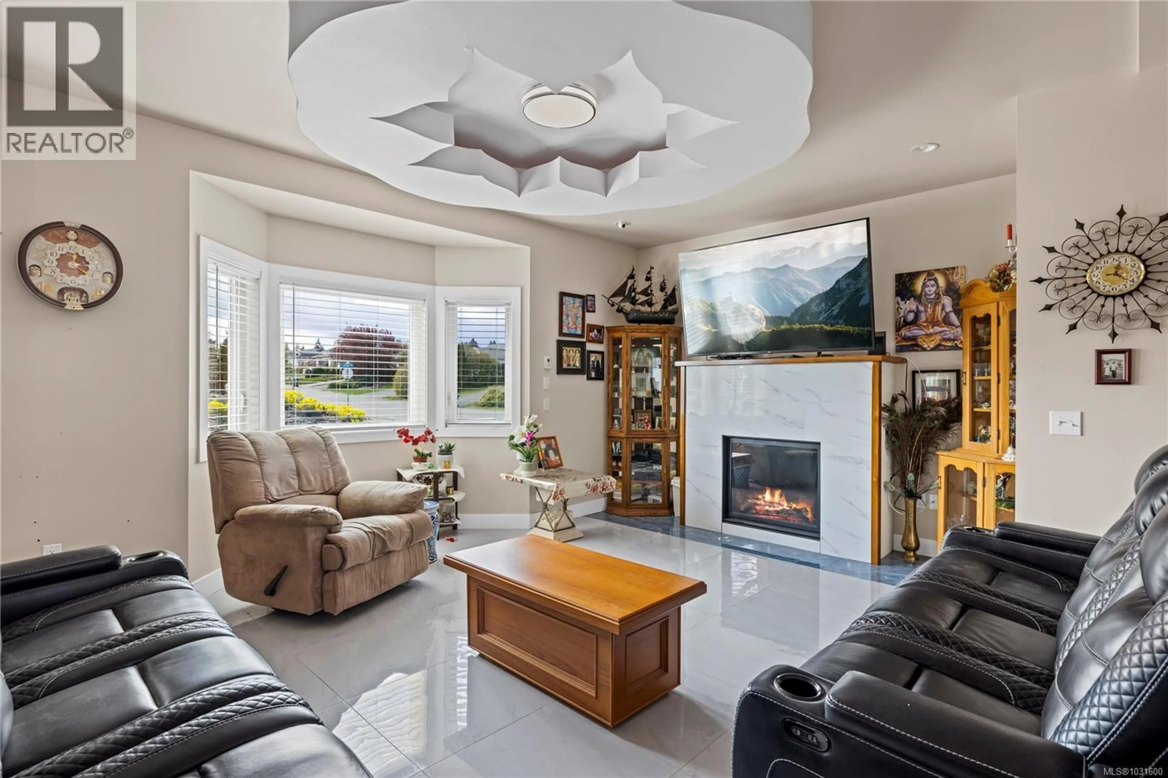 Living room with furniture, ceramic/tile floor for 787 STANHOPE ROAD, Parksville British Columbia V9P0C7