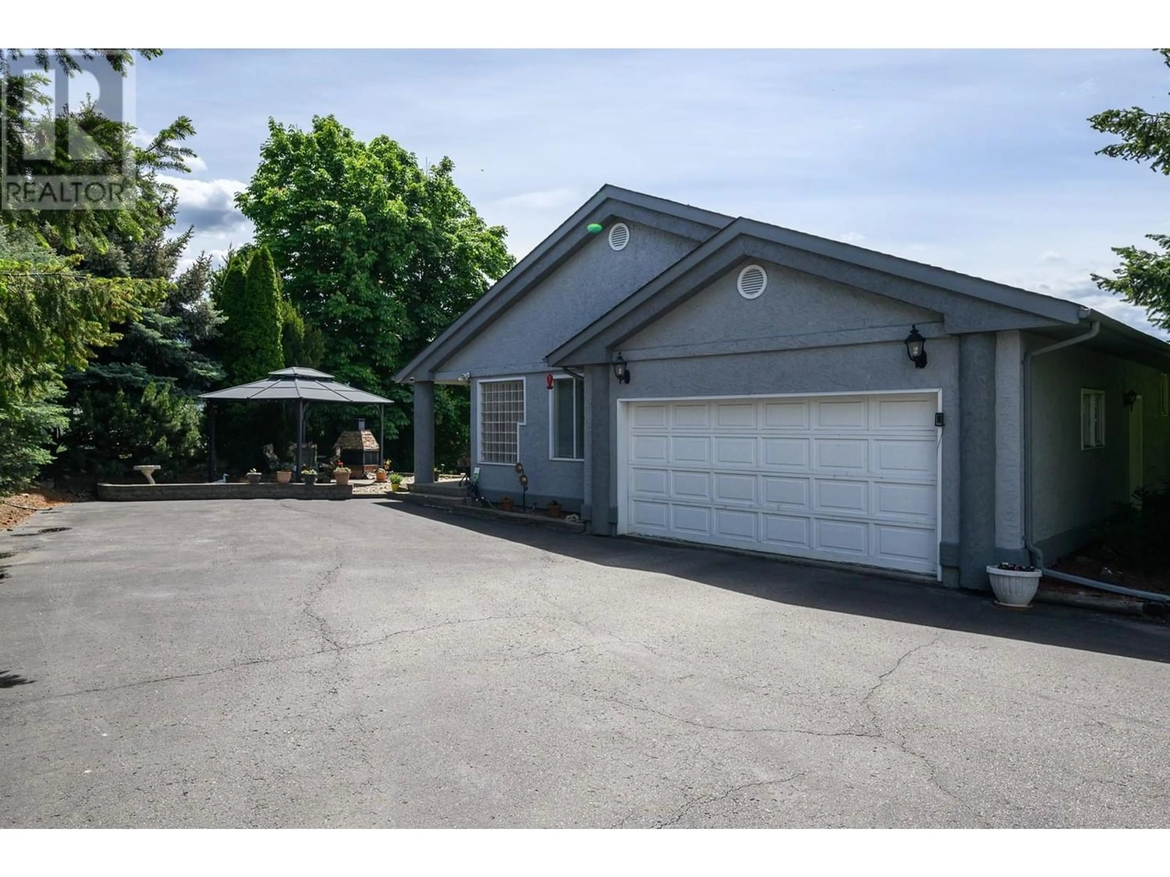 A pic from exterior of the house or condo for 9802 Buchanan Road, Coldstream British Columbia V1B3B6