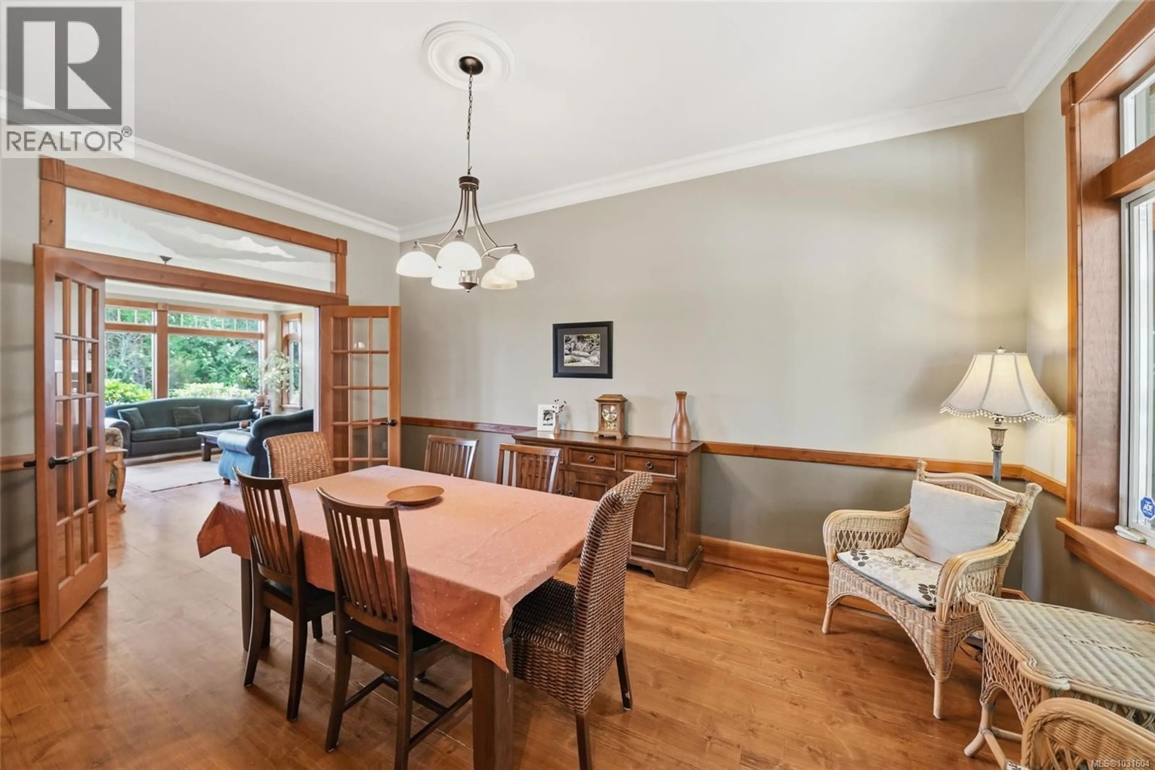 Dining room, wood/laminate floor for 1195 SPIDER LAKE ROAD, Qualicum Beach British Columbia V9K2L7