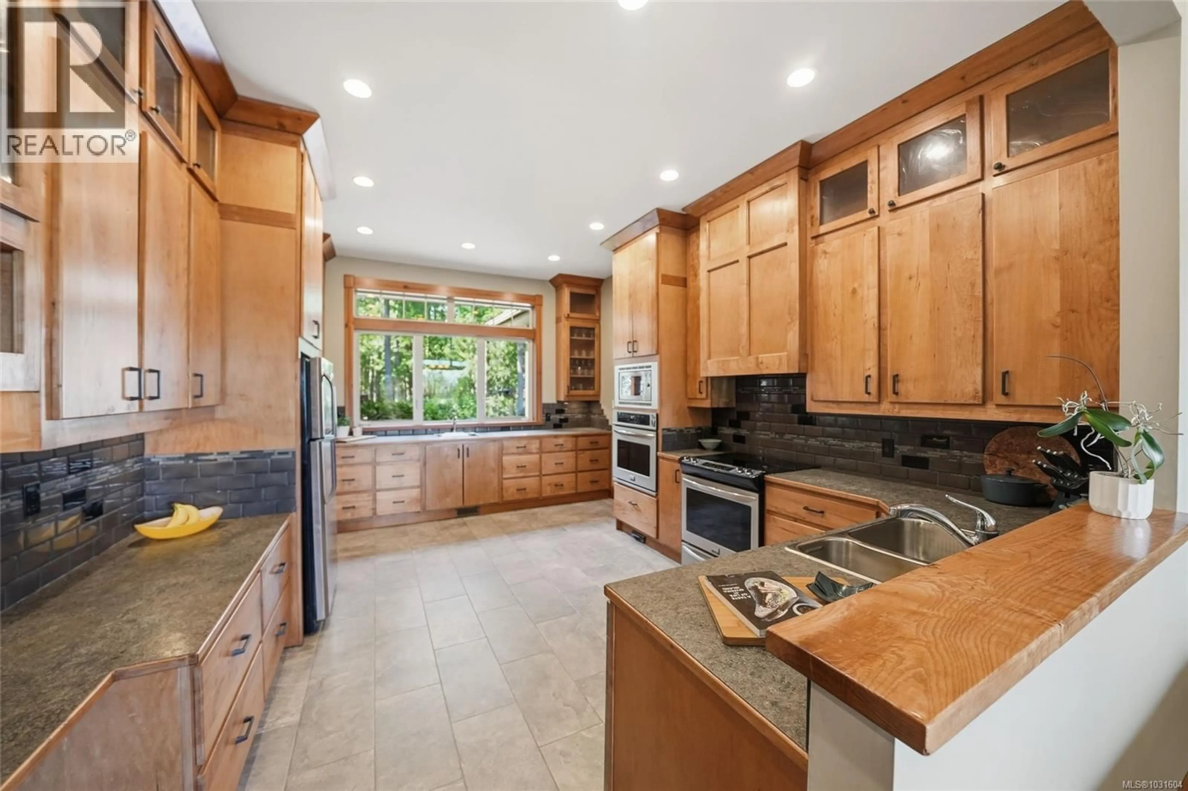 Contemporary kitchen, ceramic/tile floor for 1195 SPIDER LAKE ROAD, Qualicum Beach British Columbia V9K2L7