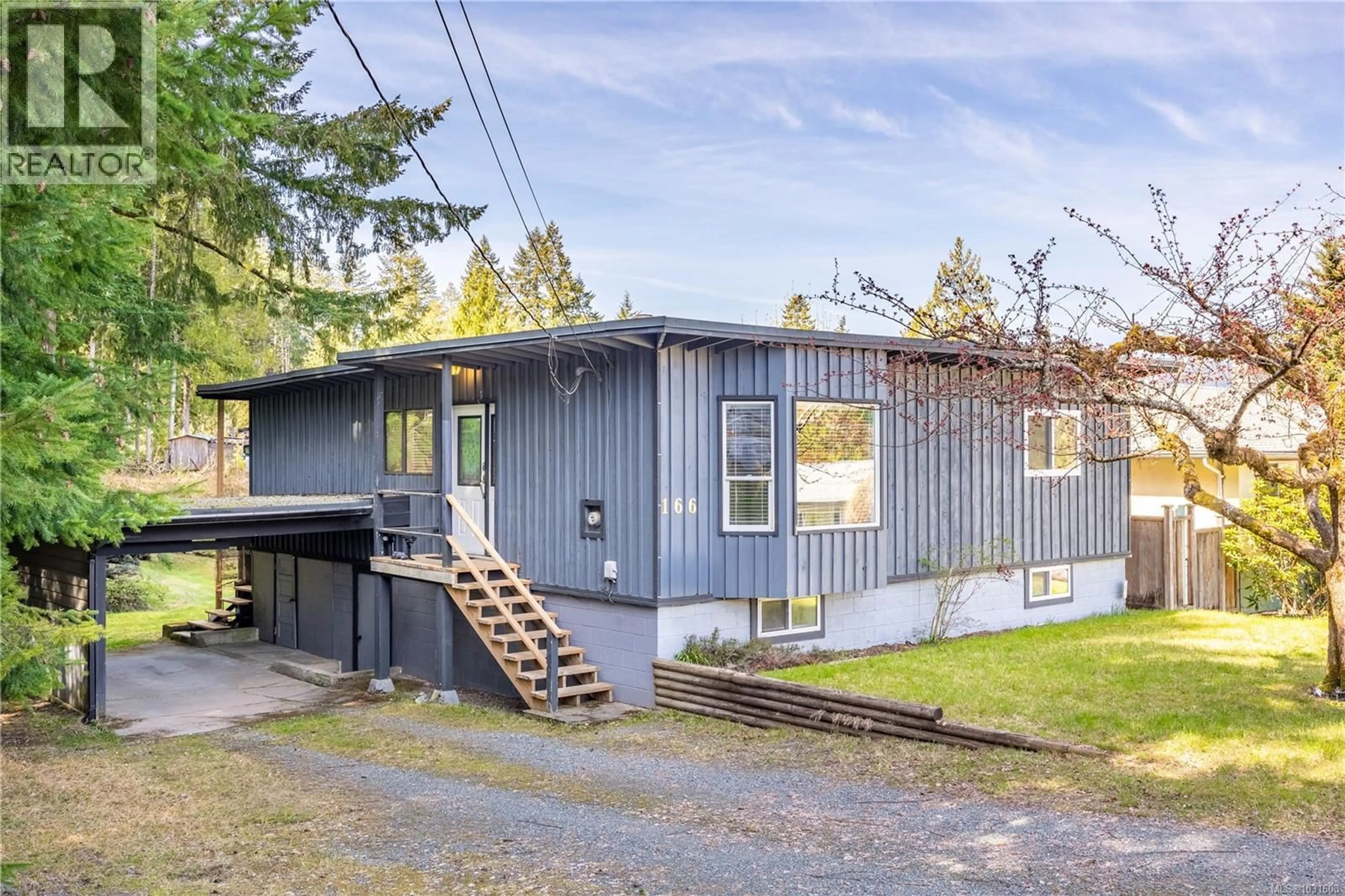 Home with vinyl exterior material, street for 166 SALL ROAD, Lake Cowichan British Columbia V0R2G0