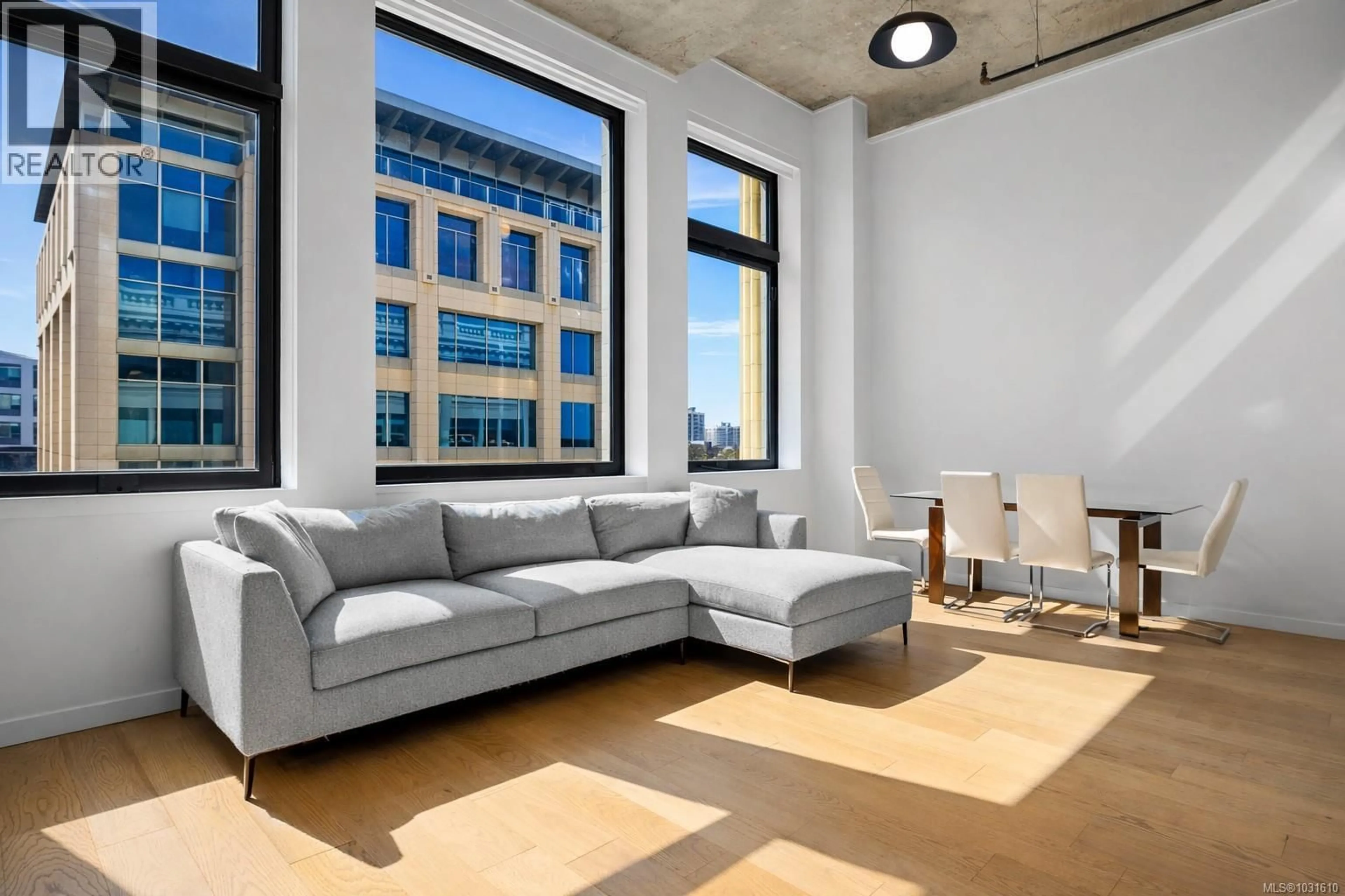 Living room with furniture, cement floor for 304 - 770 FISGARD STREET, Victoria British Columbia V8W0B8