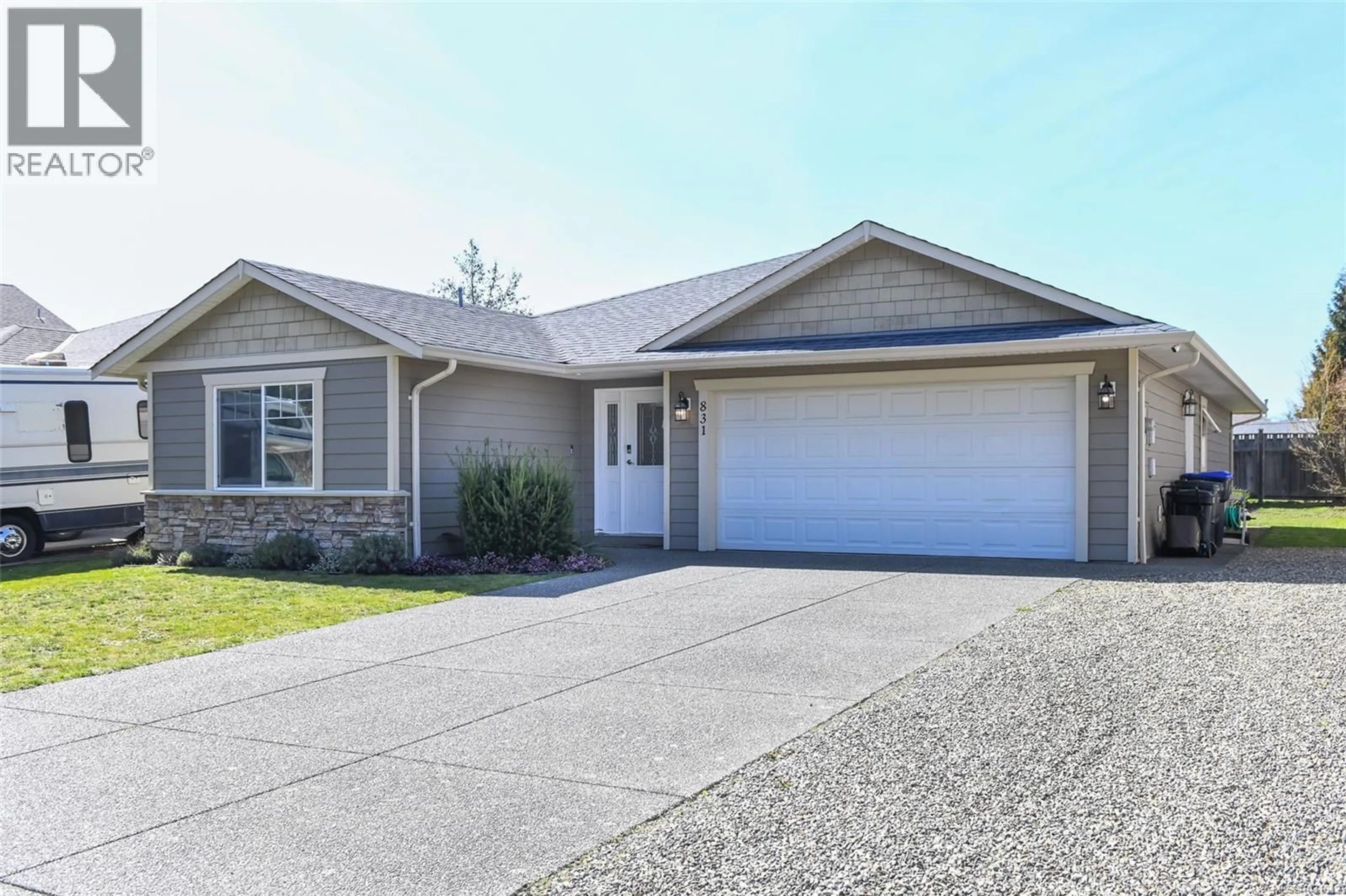 Home with vinyl exterior material, street for 831 ASPEN ROAD, Comox British Columbia V9M4H9