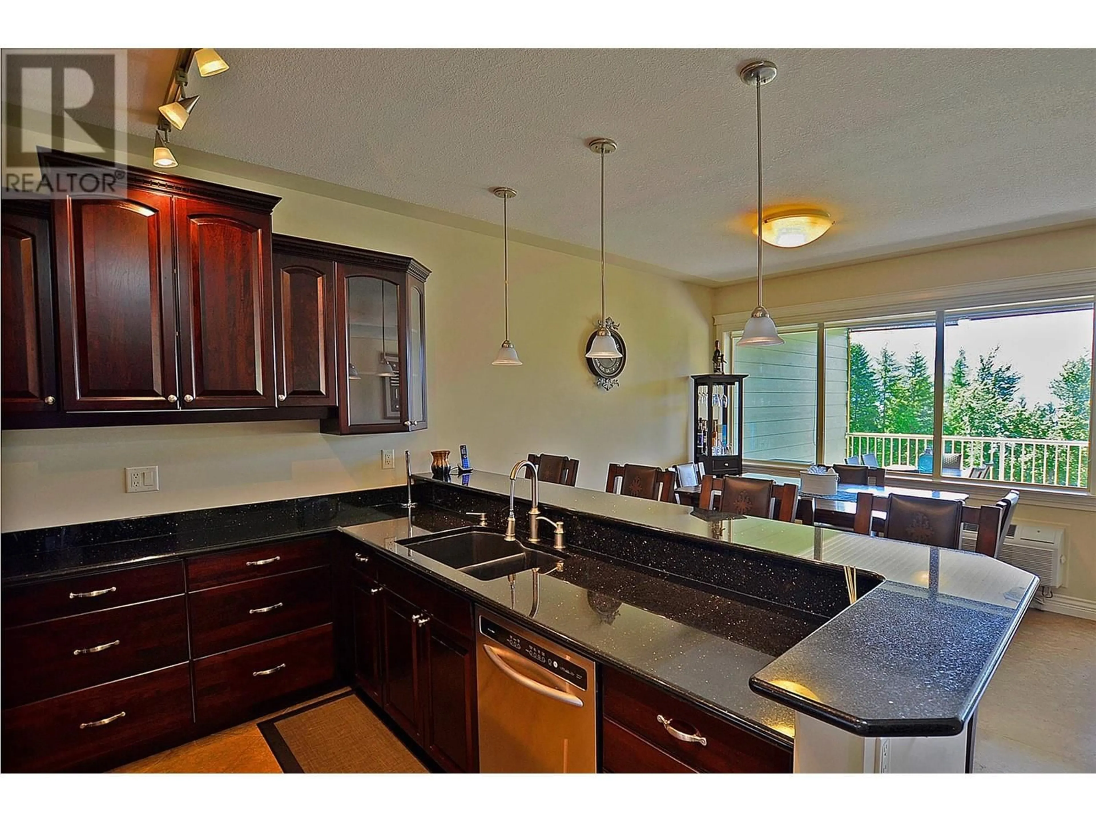 Open concept kitchen, ceramic/tile floor for A202 - 3460 PARKWAY ROAD, Enderby British Columbia V0E1V5