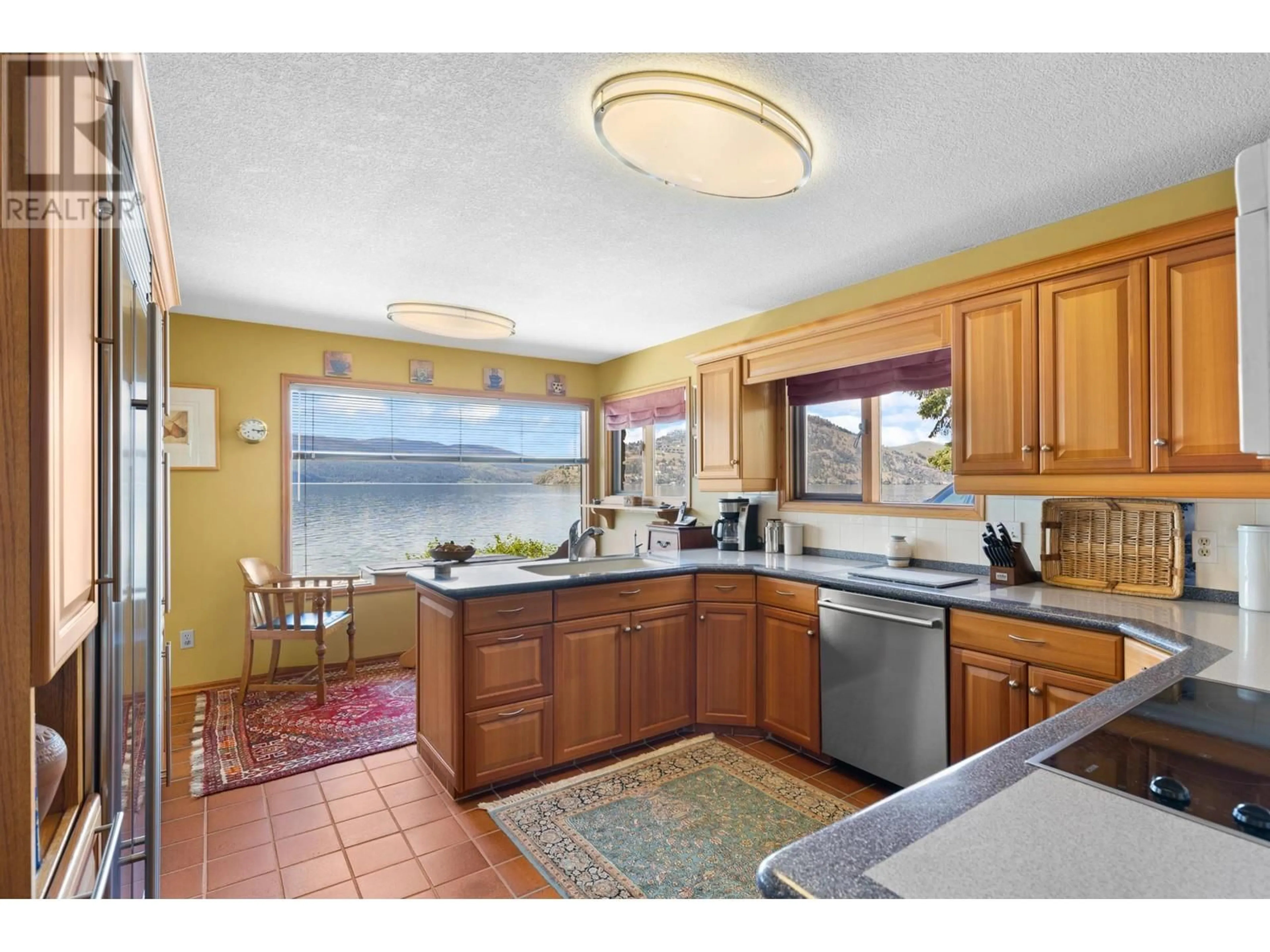 Open concept kitchen, ceramic/tile floor for 9222 SMITH ROAD, Vernon British Columbia V1H1K2
