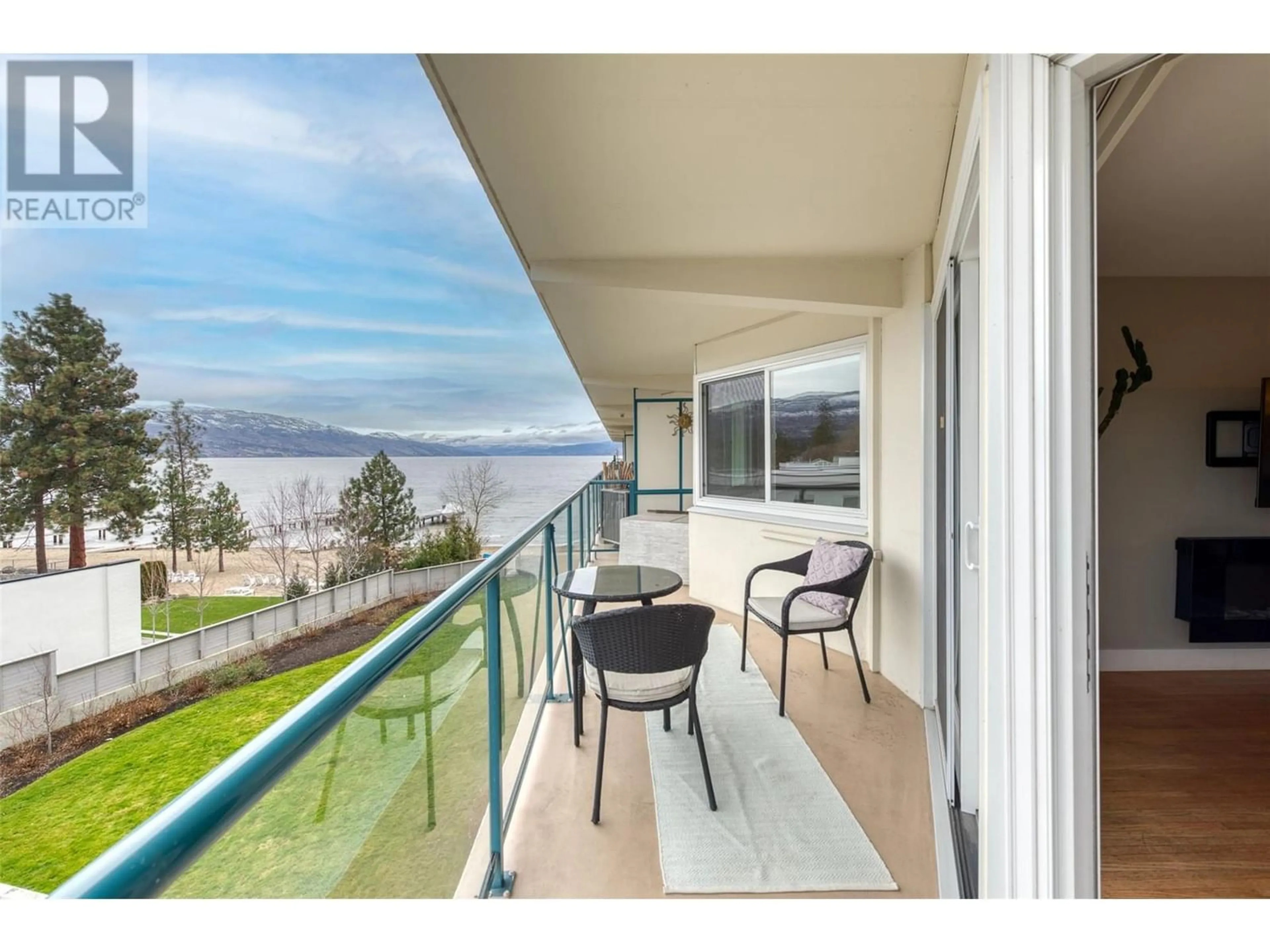 A pic from exterior of the house or condo, lake for 4058 Lakeshore Road Unit# 401, Kelowna British Columbia V1W1V6