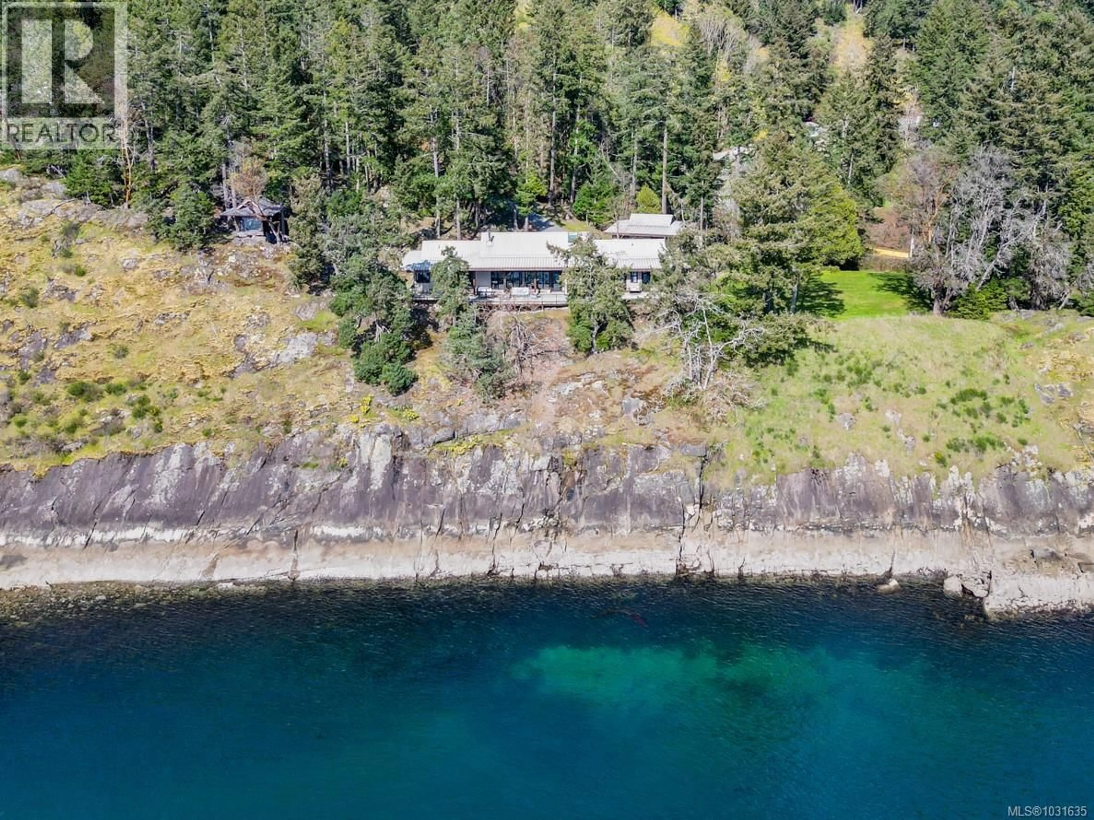 A pic from outside/outdoor area/front of a property/back of a property/a pic from drone, water/lake/river/ocean view for 1369 MACKINNON ROAD, Pender Island British Columbia V0N2M1