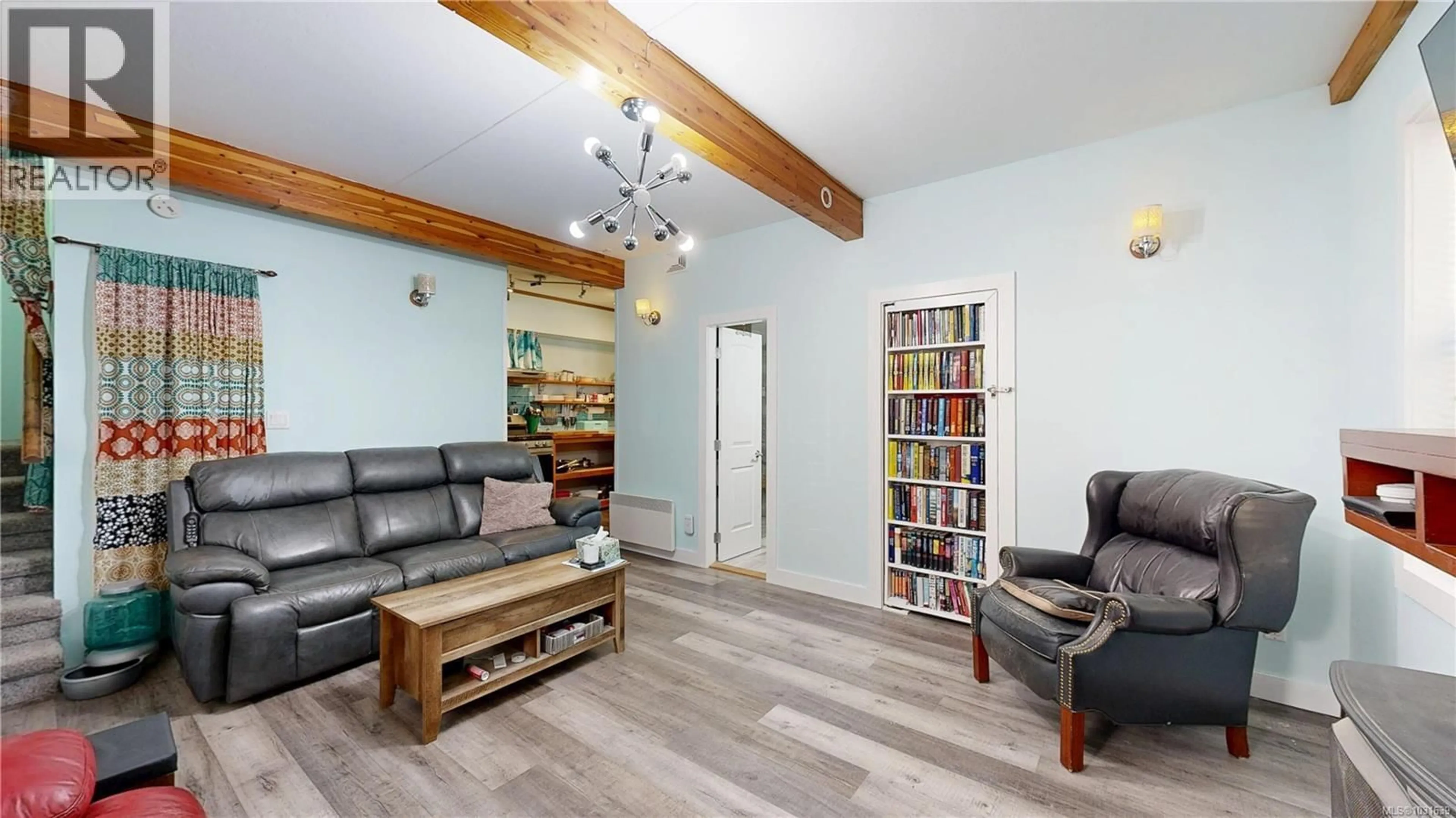 Living room with furniture, wood/laminate floor for 1211 HARRISON WAY, Gabriola Island British Columbia V0R1X2