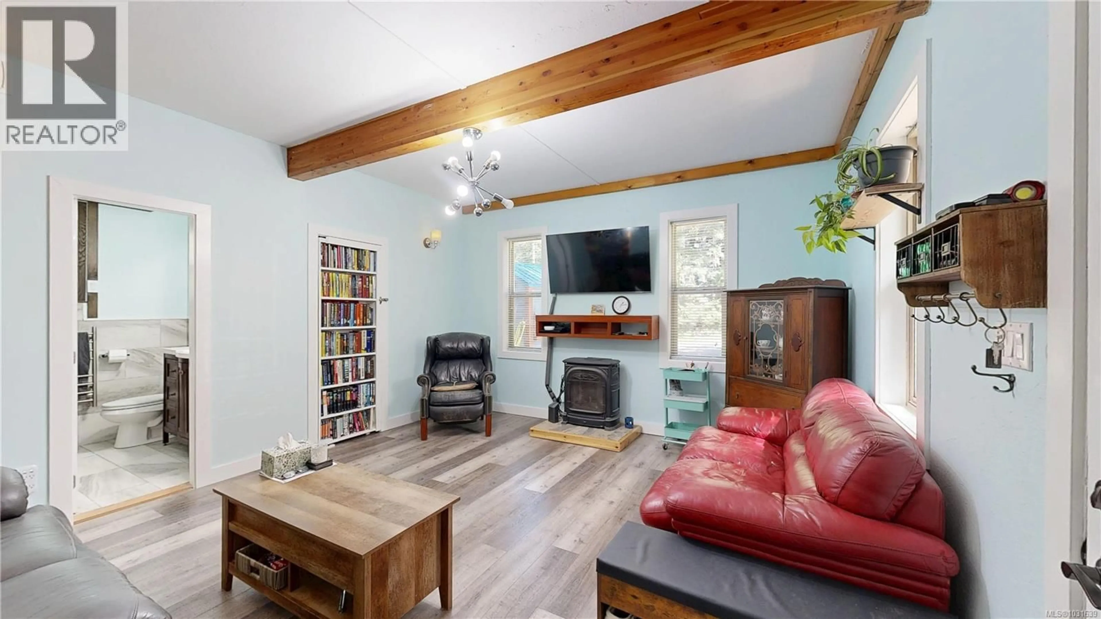 Living room with furniture, wood/laminate floor for 1211 HARRISON WAY, Gabriola Island British Columbia V0R1X2