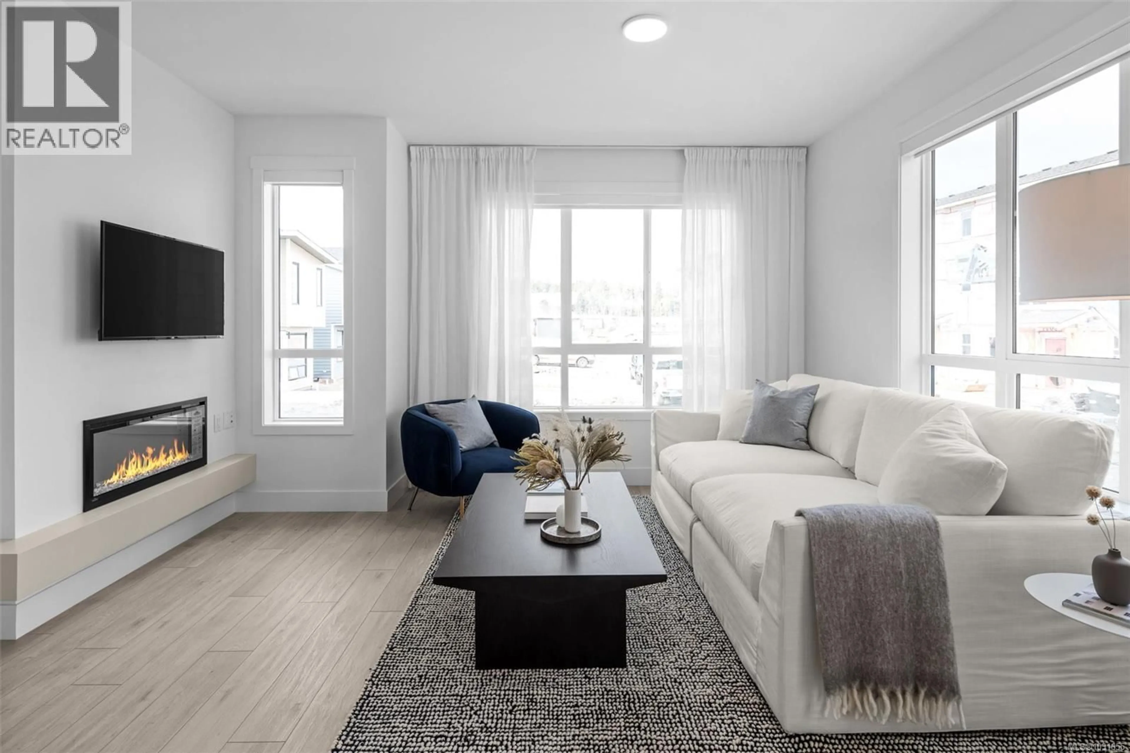 Living room with furniture, unknown for 100 - 368 TRADEWINDS AVENUE, Colwood British Columbia V9C0S5