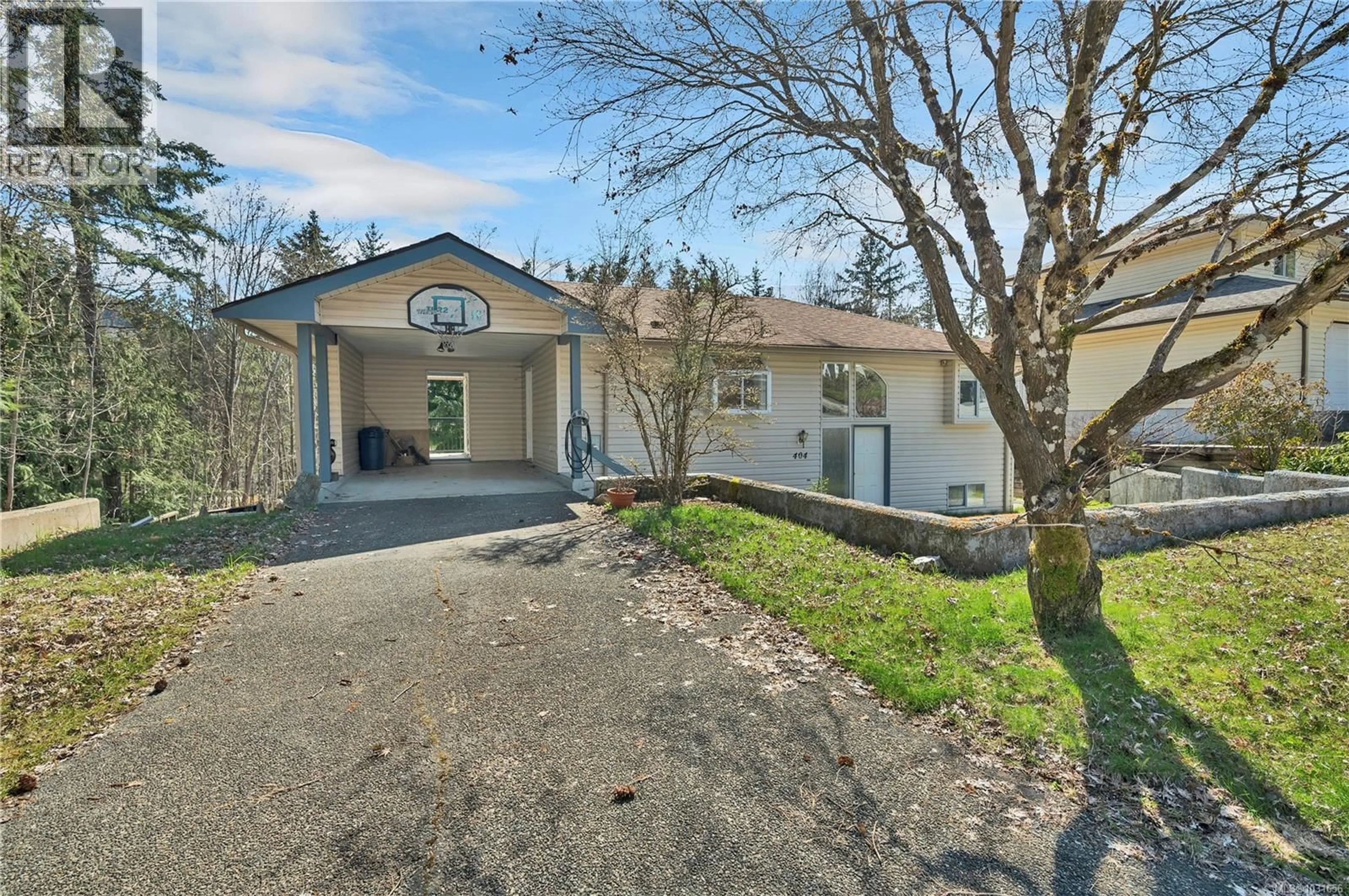 A pic from outside/outdoor area/front of a property/back of a property/a pic from drone, street for 404 DONNER DRIVE, Gold River British Columbia V0P1G0