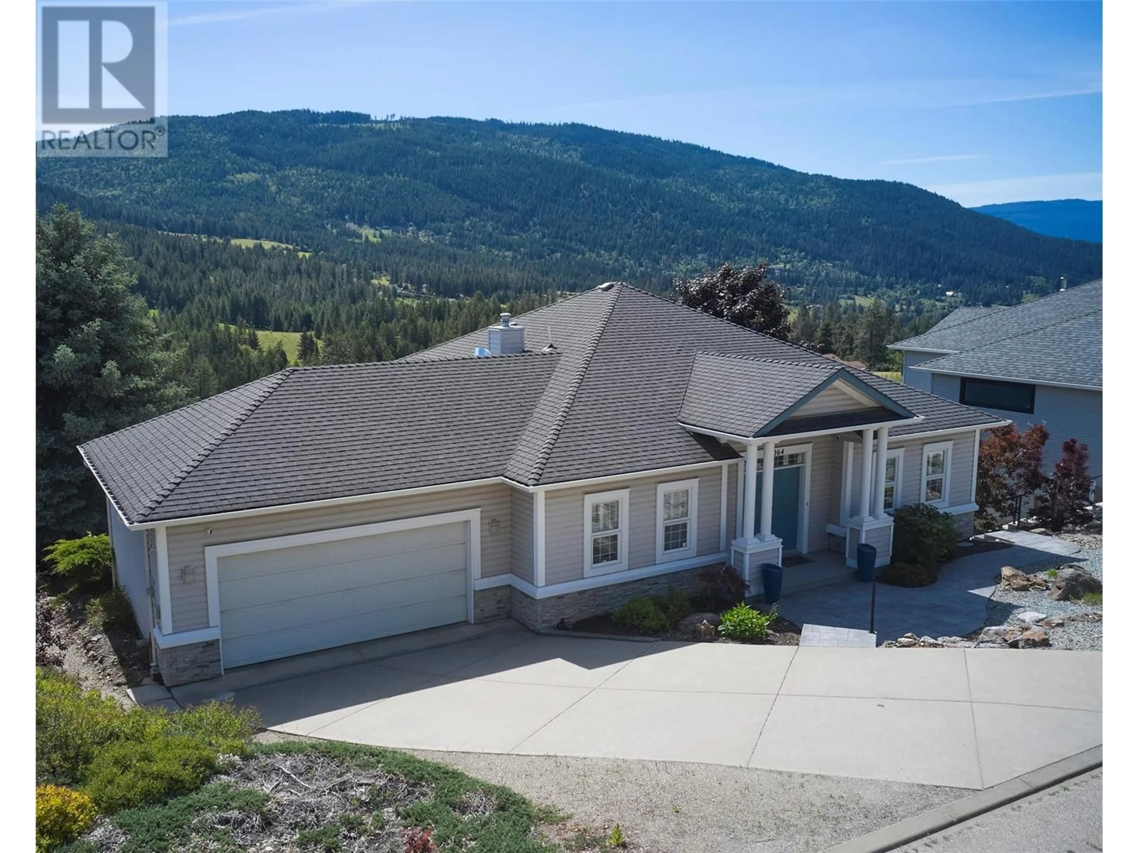 Frontside or backside of a home for 7064 Nakiska Drive Lot# LOT 13, Vernon British Columbia V1B3M5