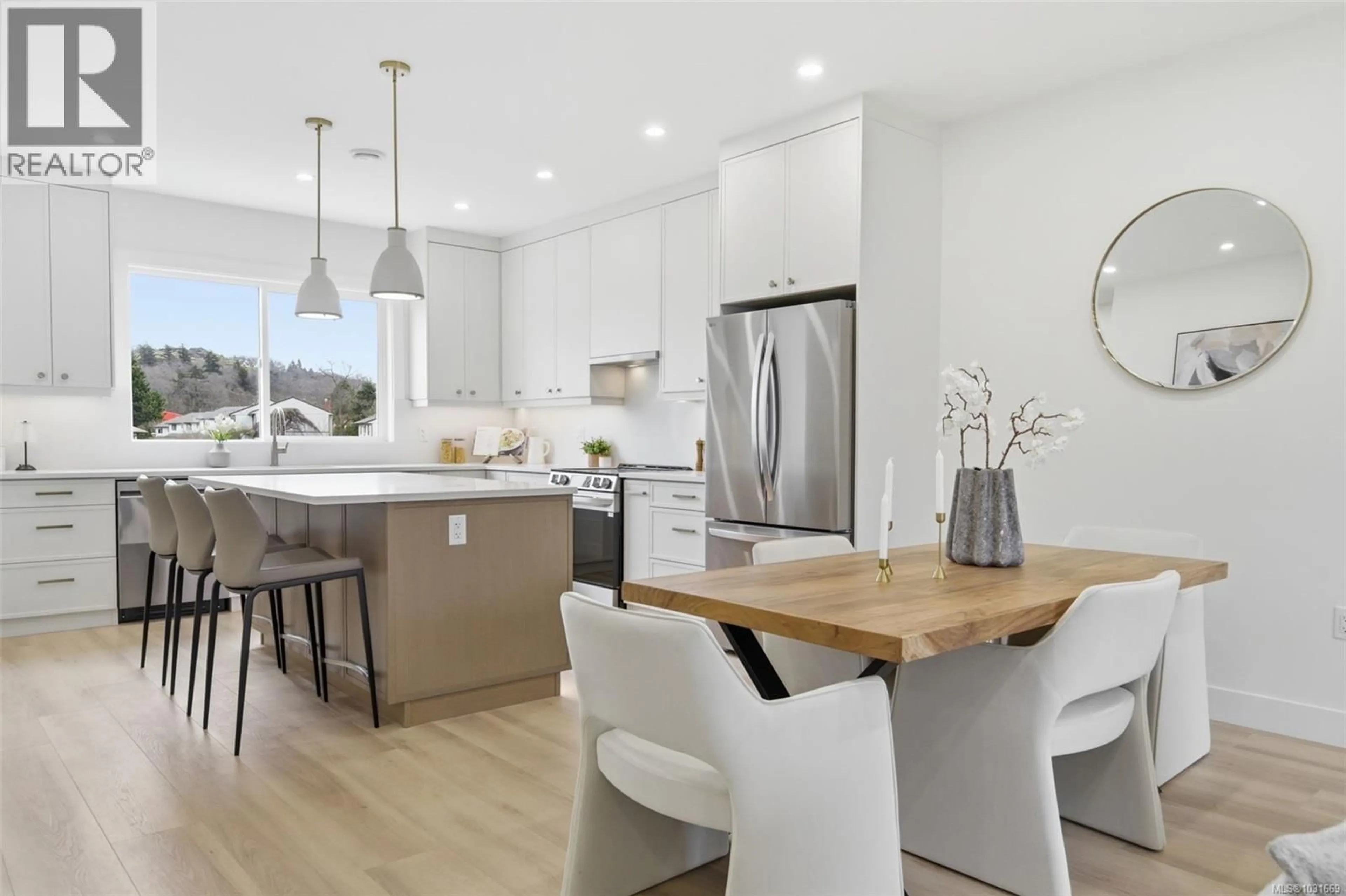 Open concept kitchen, wood/laminate floor for 1 - 621 BROADWAY STREET, Saanich British Columbia V8Z2G5