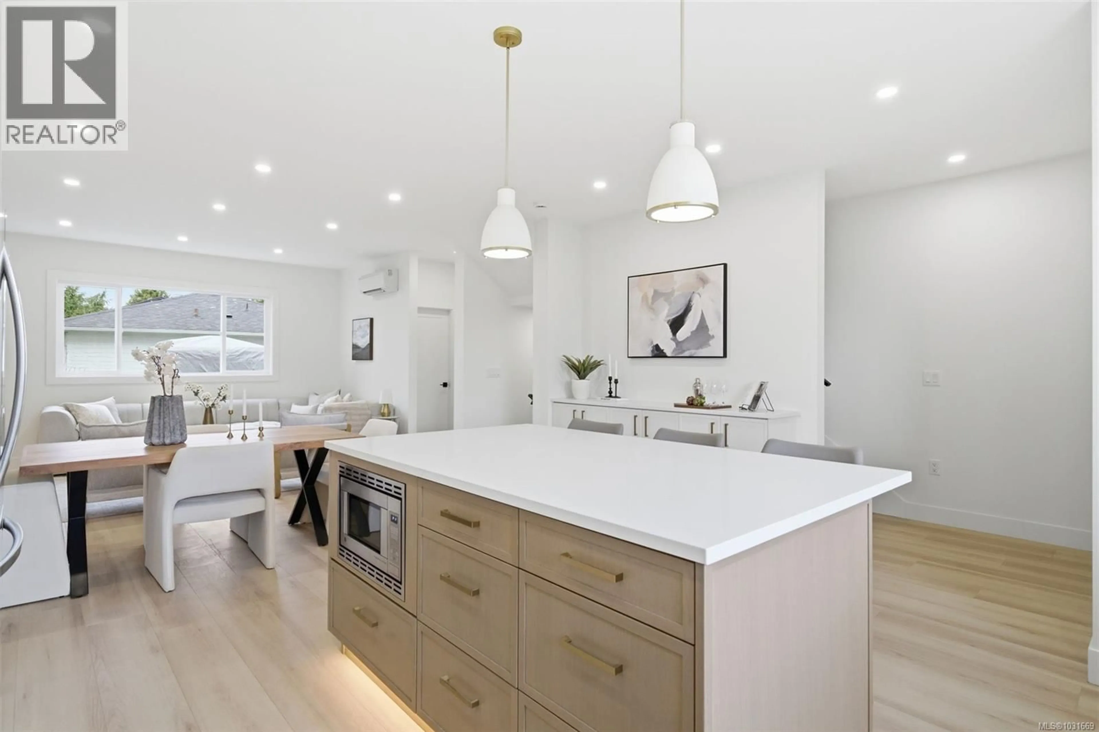 Open concept kitchen, wood/laminate floor for 1 - 621 BROADWAY STREET, Saanich British Columbia V8Z2G5