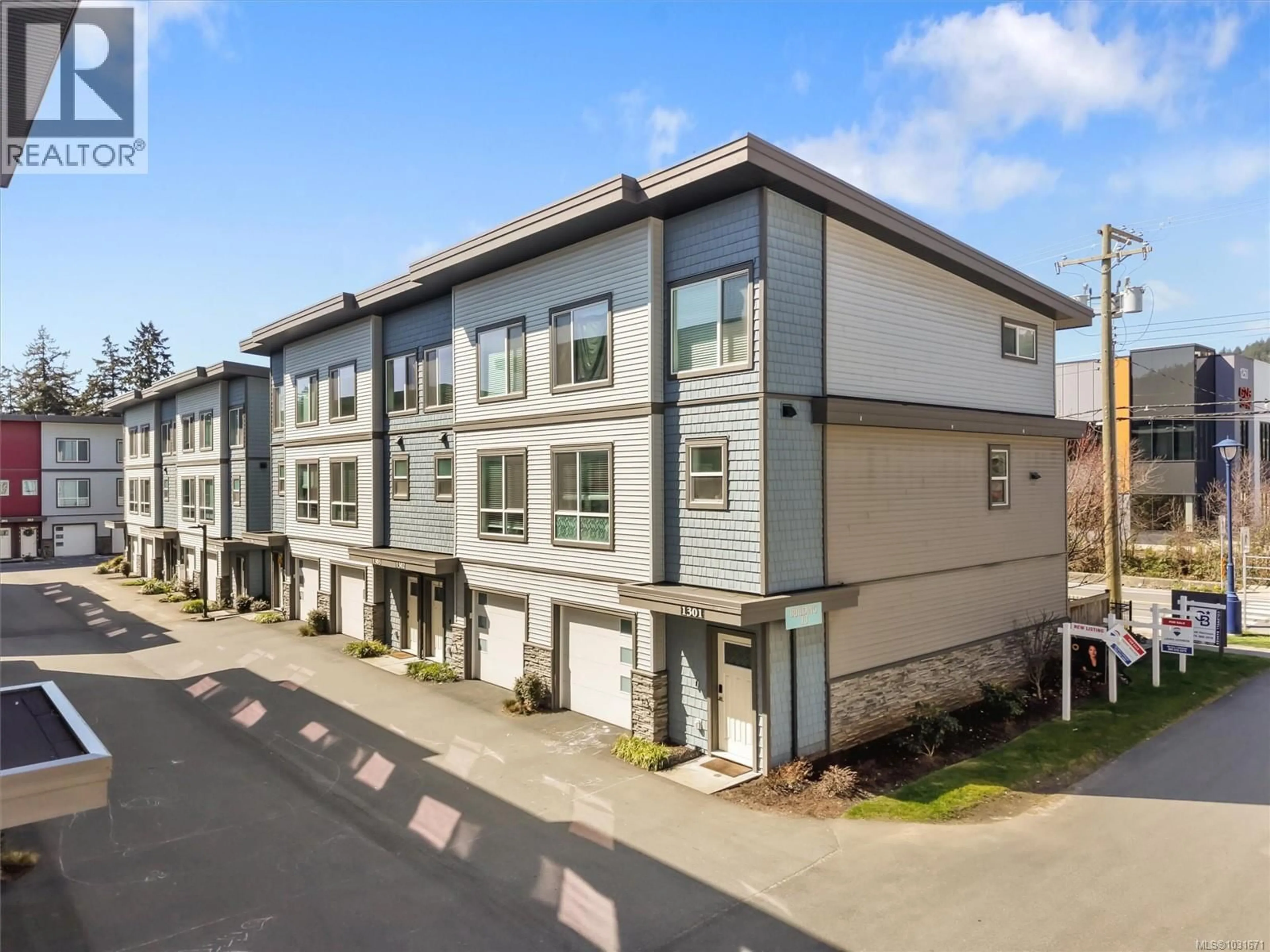 A pic from outside/outdoor area/front of a property/back of a property/a pic from drone, street for 1303 - 3351 LUXTON ROAD, Langford British Columbia V9C0P2