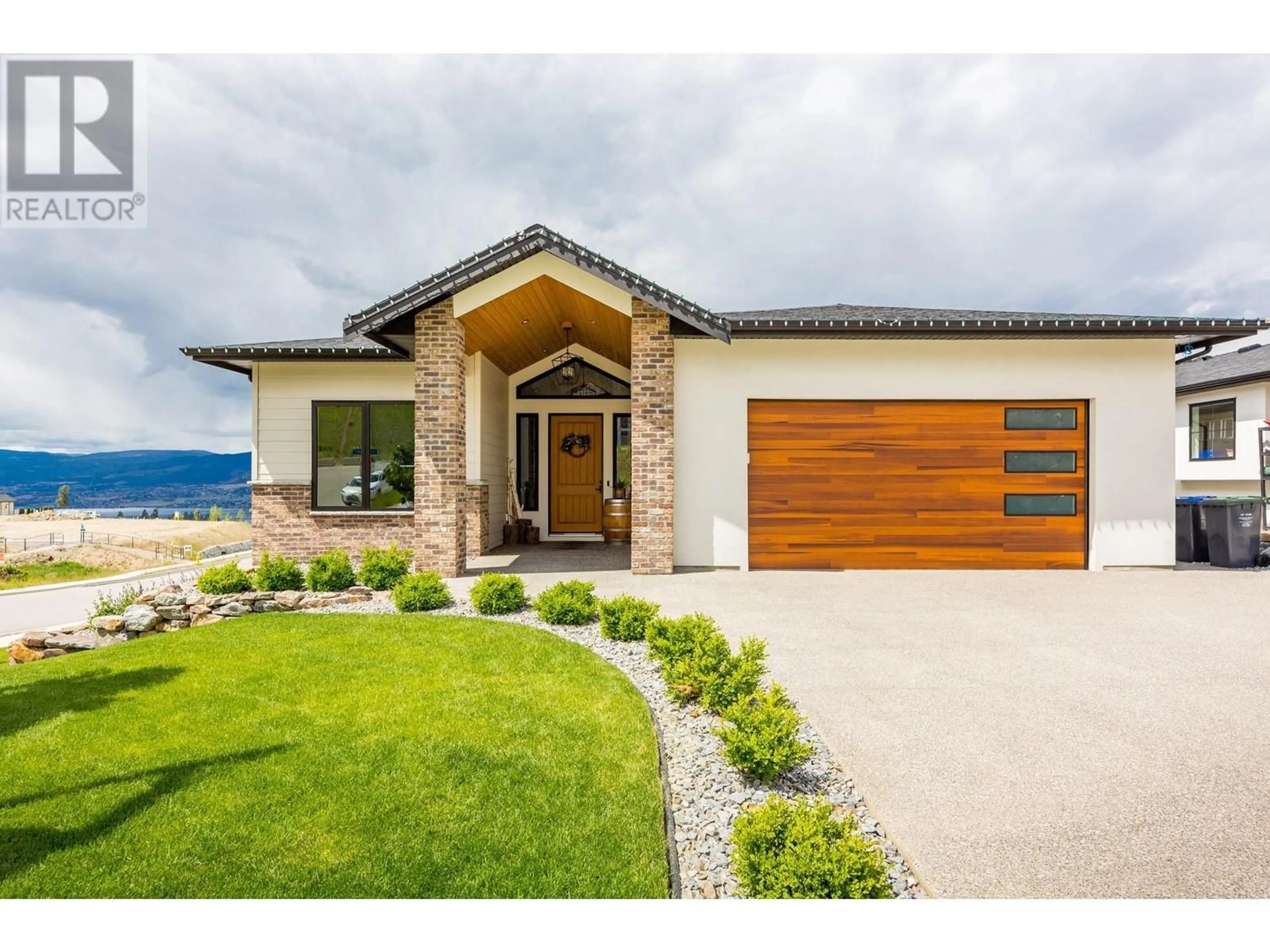 Home with brick exterior material for 1562 Antler Court, Kelowna British Columbia V1W5N9