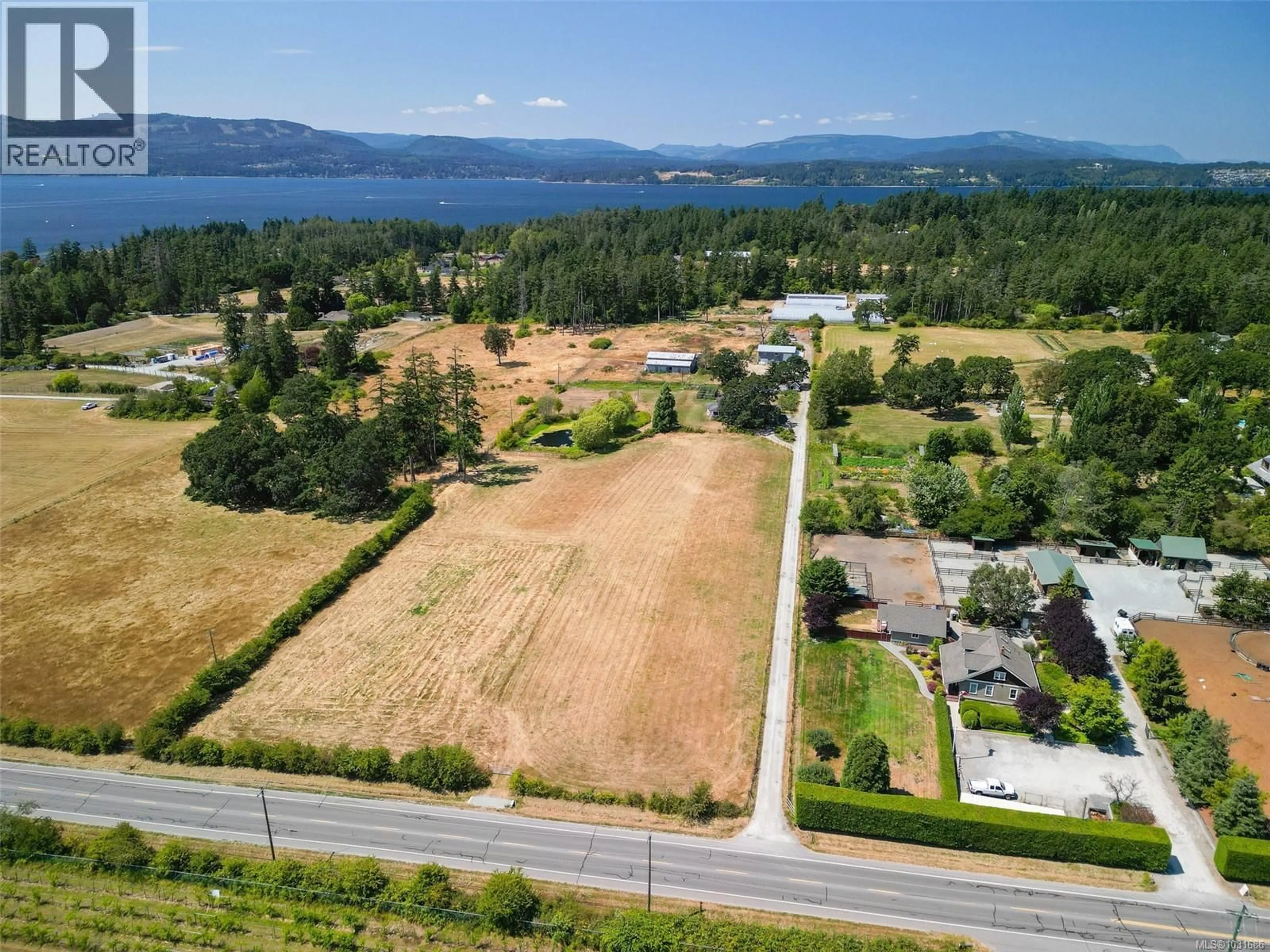 A pic from outside/outdoor area/front of a property/back of a property/a pic from drone, water/lake/river/ocean view for 10650 WEST SAANICH ROAD, North Saanich British Columbia V8L5L6