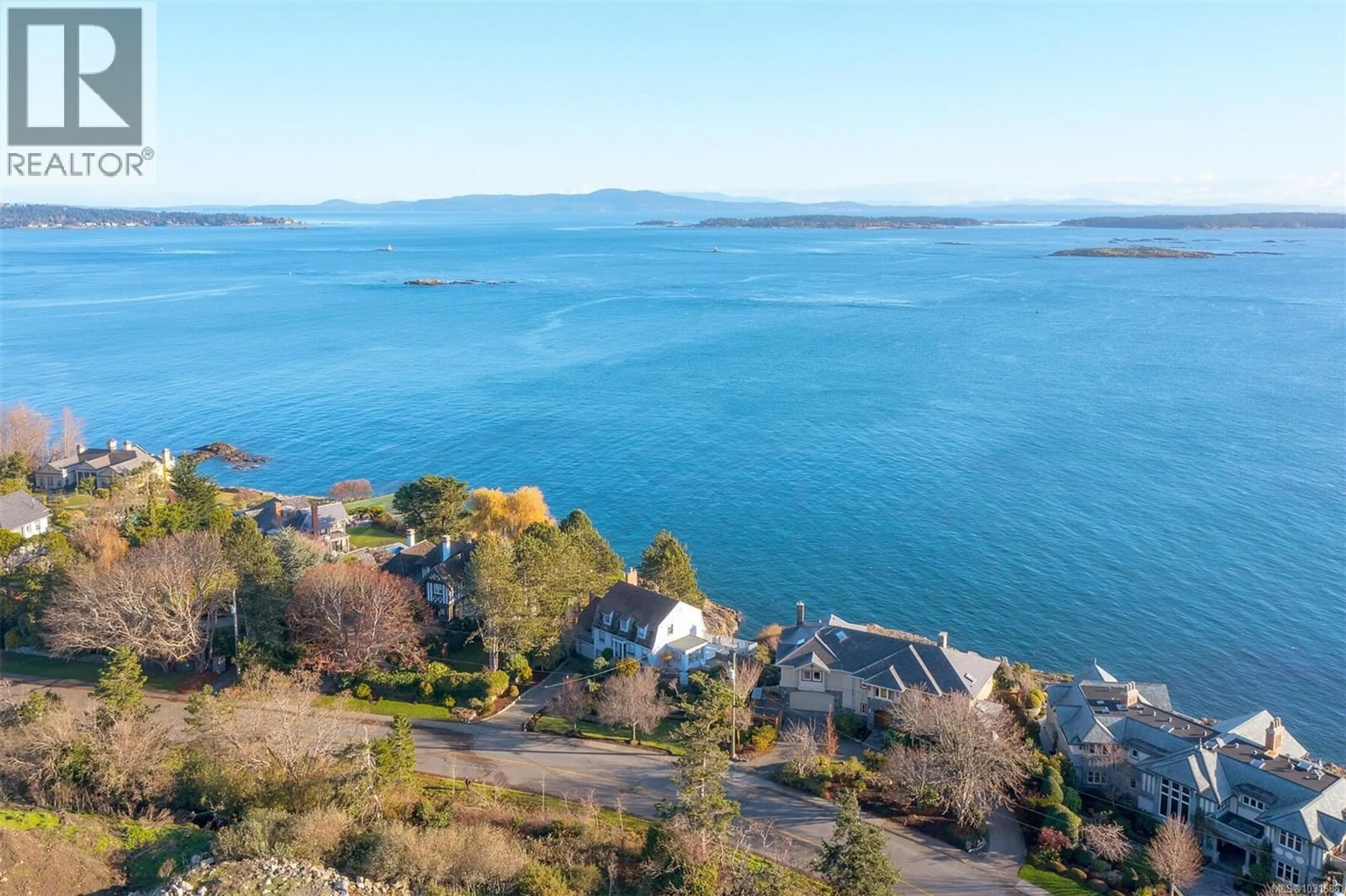 A pic from outside/outdoor area/front of a property/back of a property/a pic from drone, water/lake/river/ocean view for 987 BEACH DRIVE, Oak Bay British Columbia V8S2N2