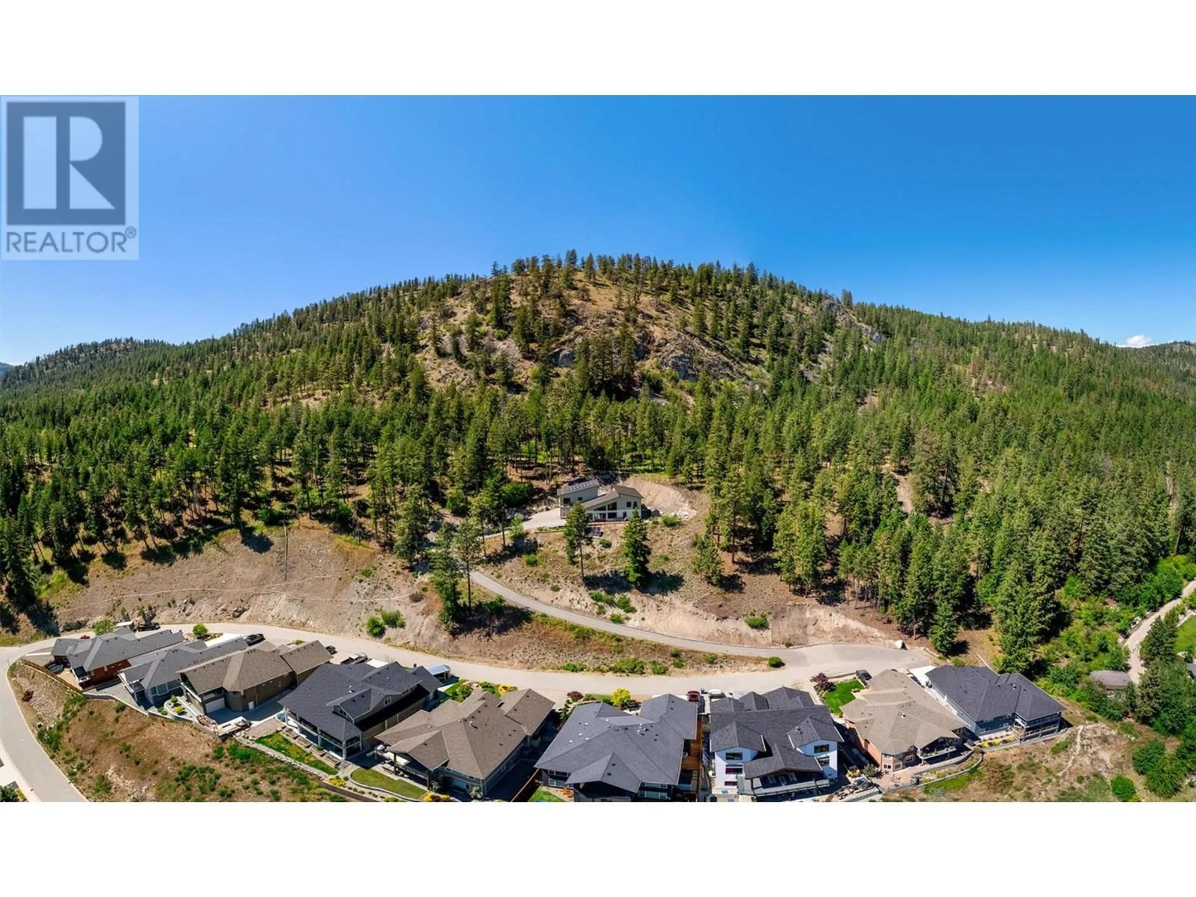 A pic from outside/outdoor area/front of a property/back of a property/a pic from drone, mountain view for 6131 SEYMOURE LANE, Peachland British Columbia V0H1X4