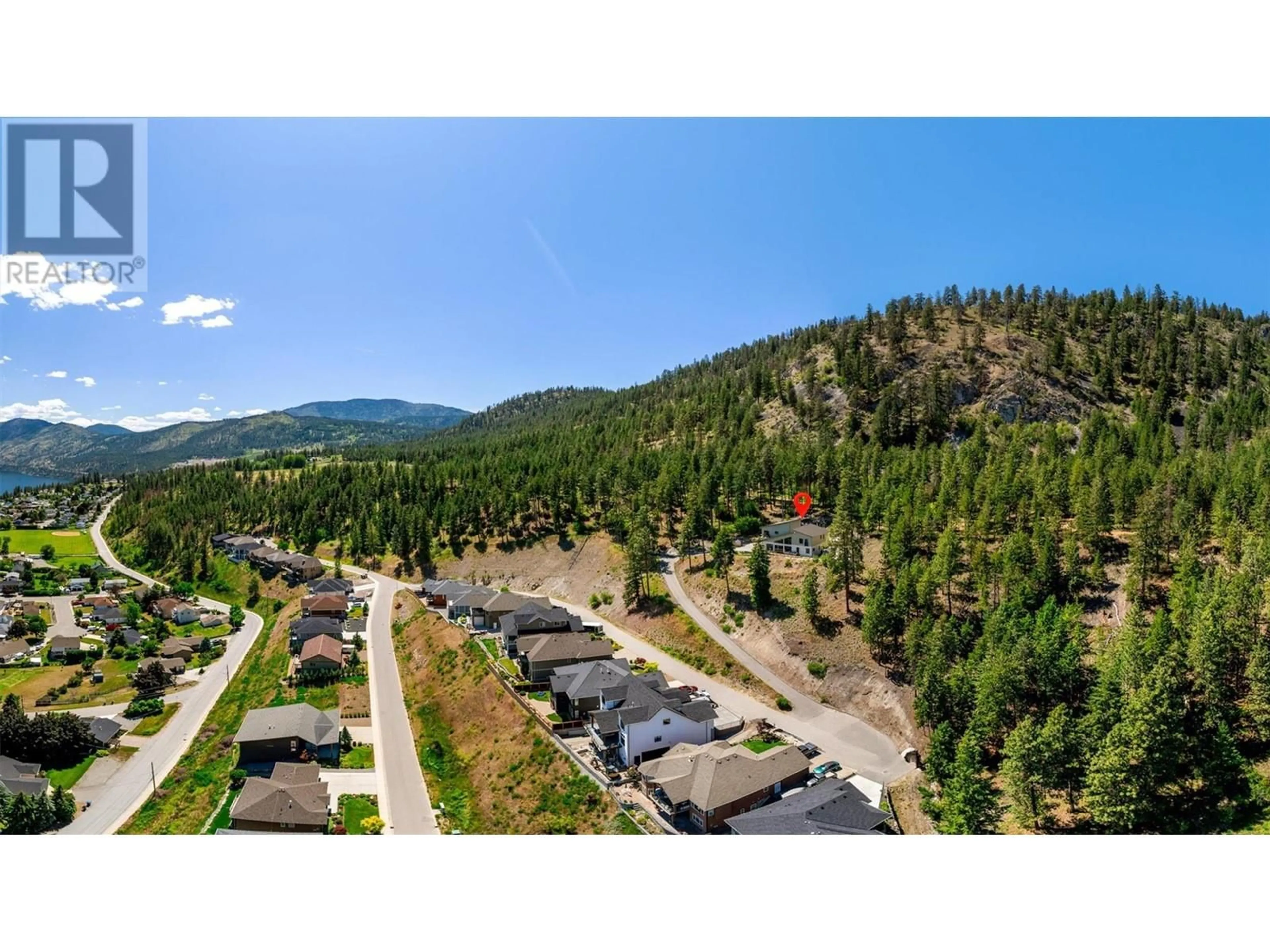 A pic from outside/outdoor area/front of a property/back of a property/a pic from drone, mountain view for 6131 SEYMOURE LANE, Peachland British Columbia V0H1X4