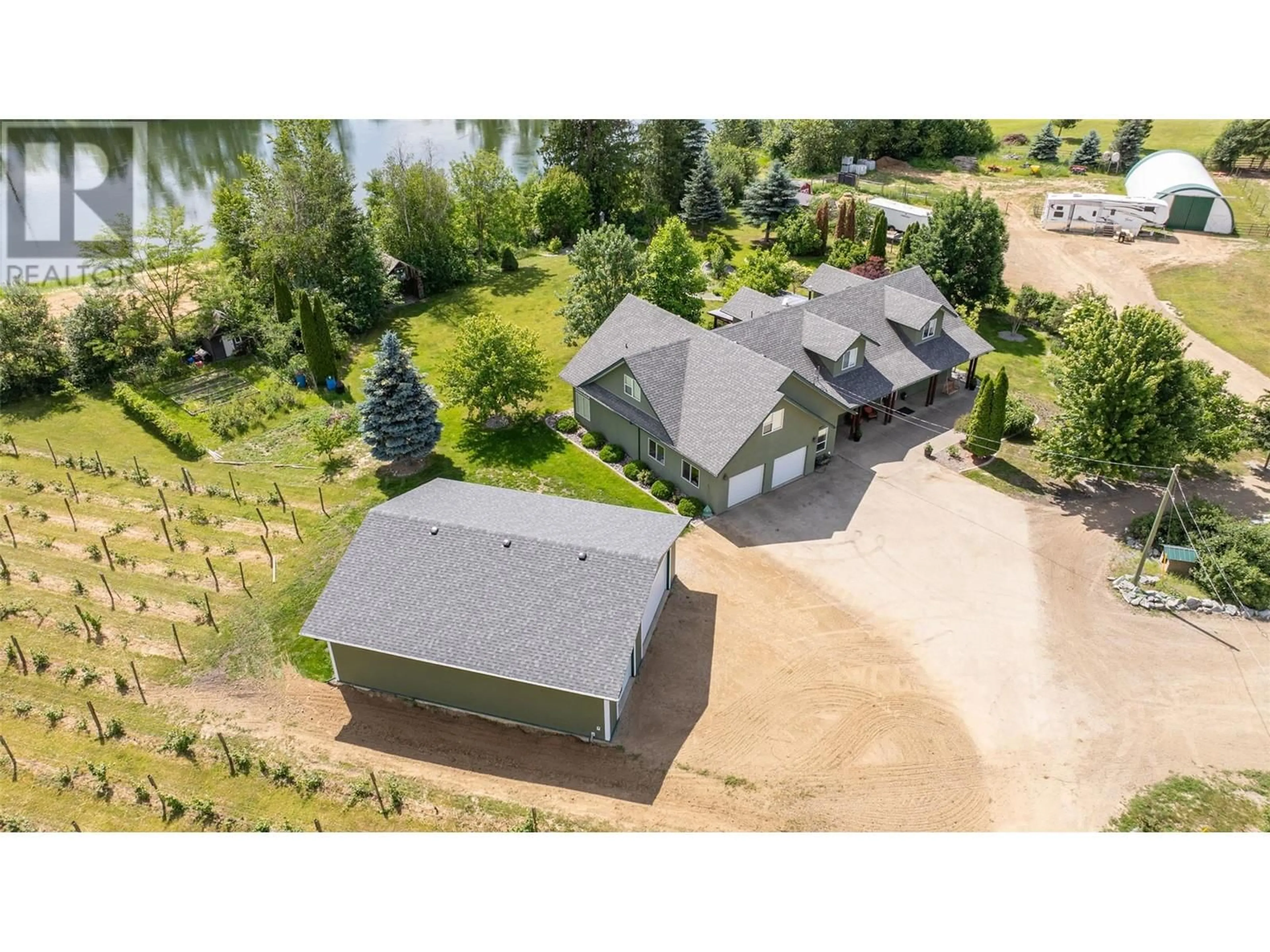 A pic from outside/outdoor area/front of a property/back of a property/a pic from drone, water/lake/river/ocean view for 70 WATERSIDE ROAD, Enderby British Columbia V0E1V3