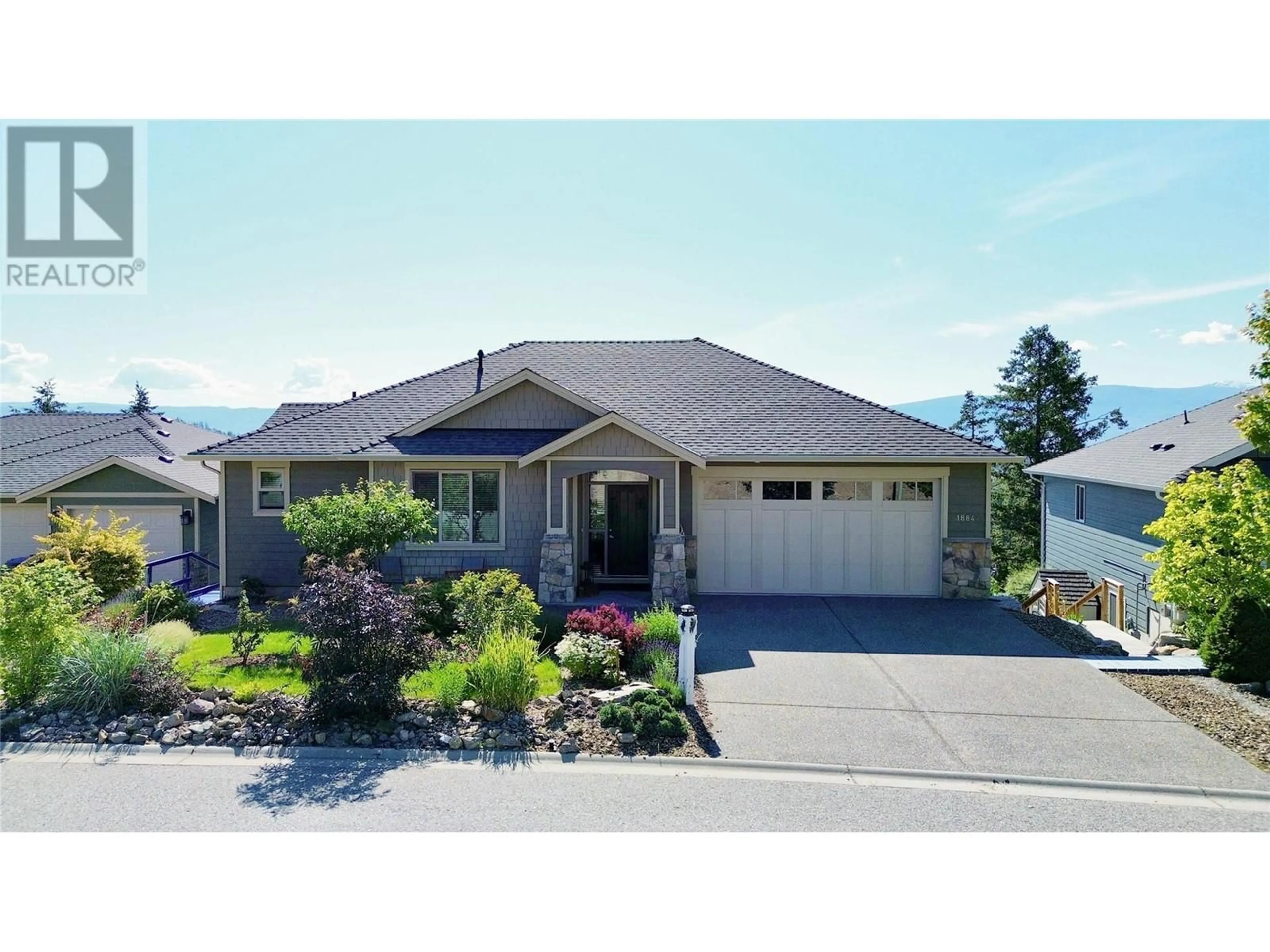 Frontside or backside of a home for 1884 Rosealee Lane, West Kelowna British Columbia V1Z4C7