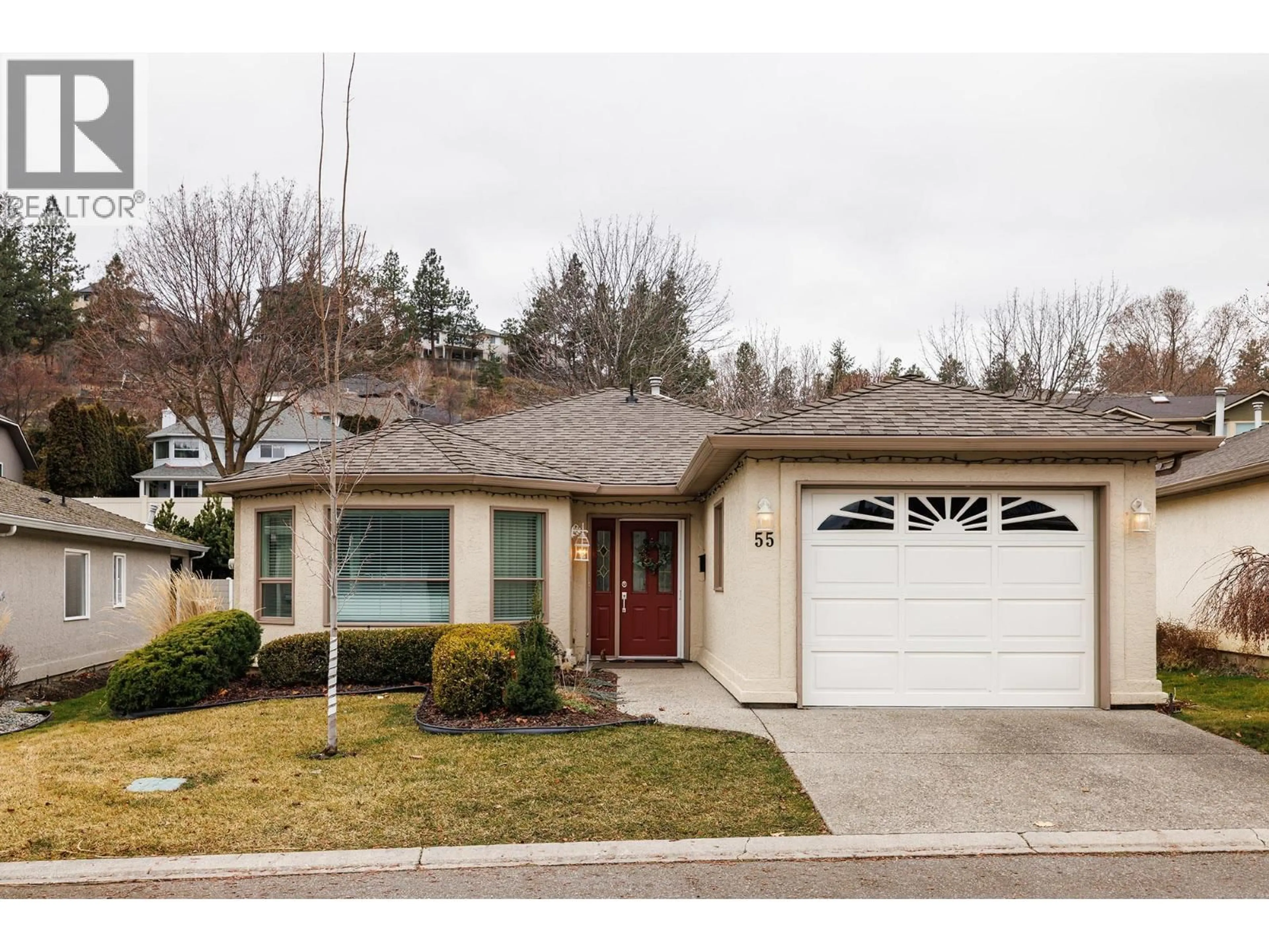 Home with vinyl exterior material, street for 55 - 615 GLENMEADOWS ROAD, Kelowna British Columbia V1V1N9