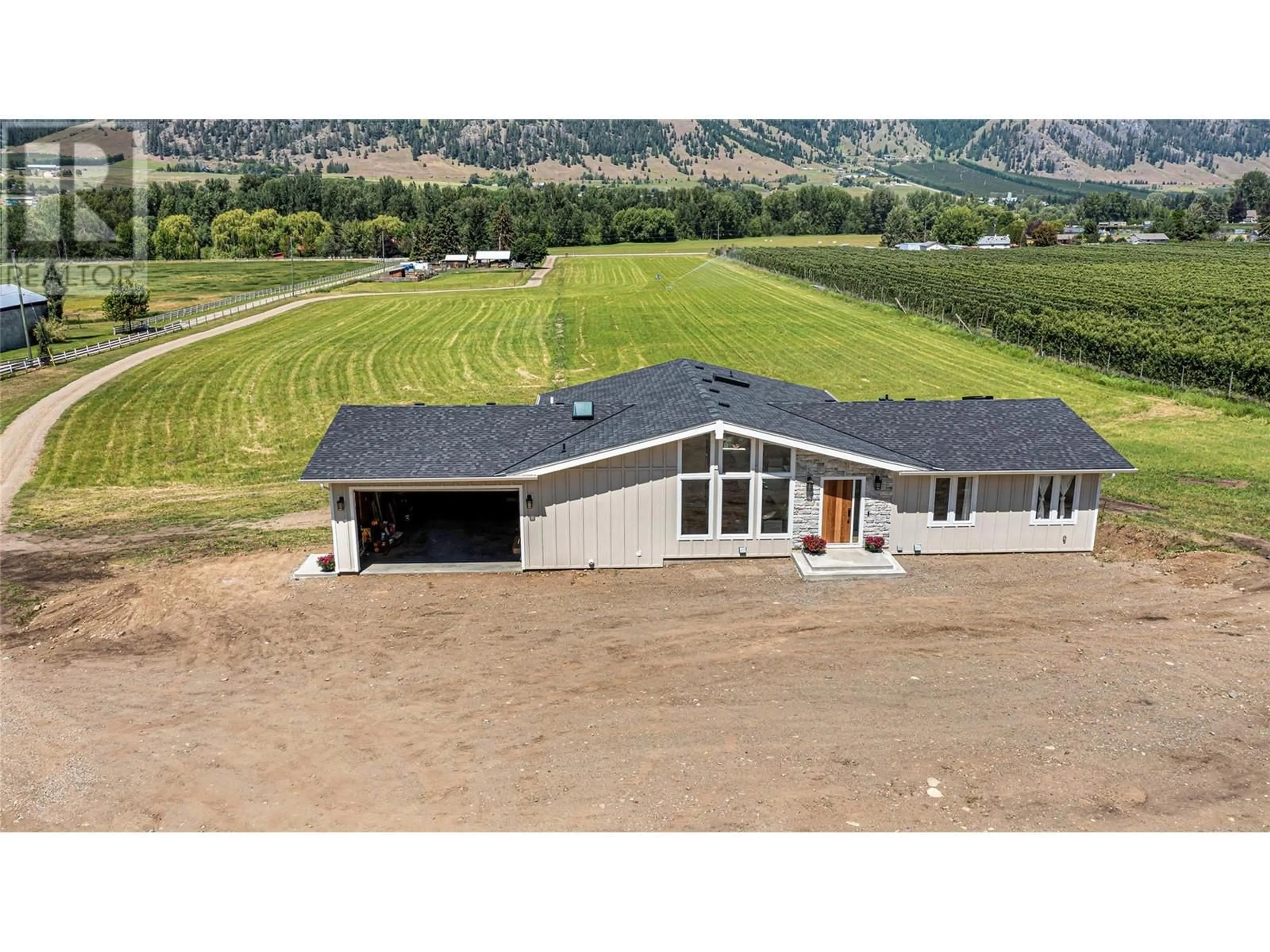 Home with vinyl exterior material for 6900 Learmouth Road, Coldstream British Columbia V1B3G9