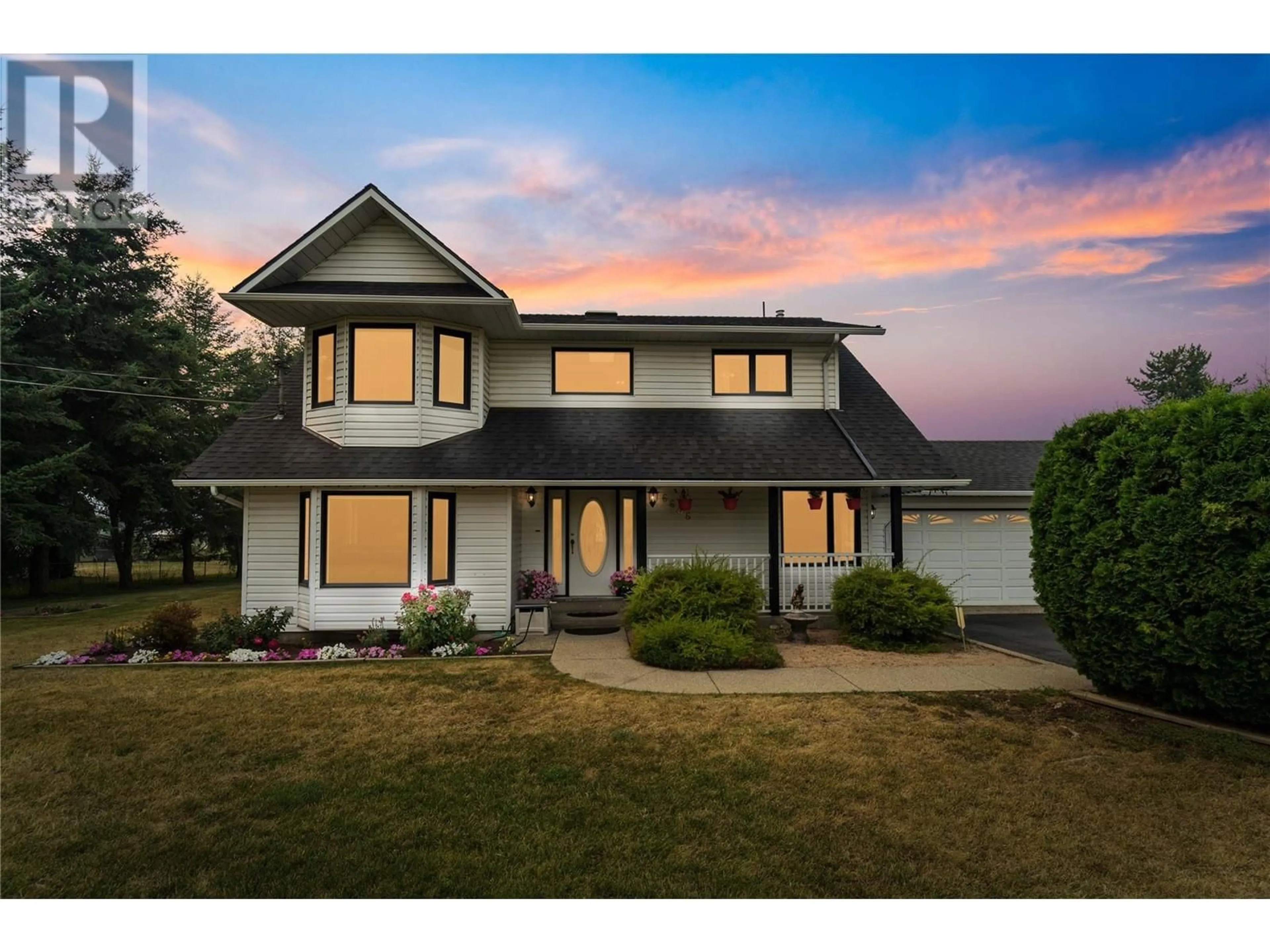 Frontside or backside of a home for 6606 Learmouth Road, Coldstream British Columbia V1B3G9