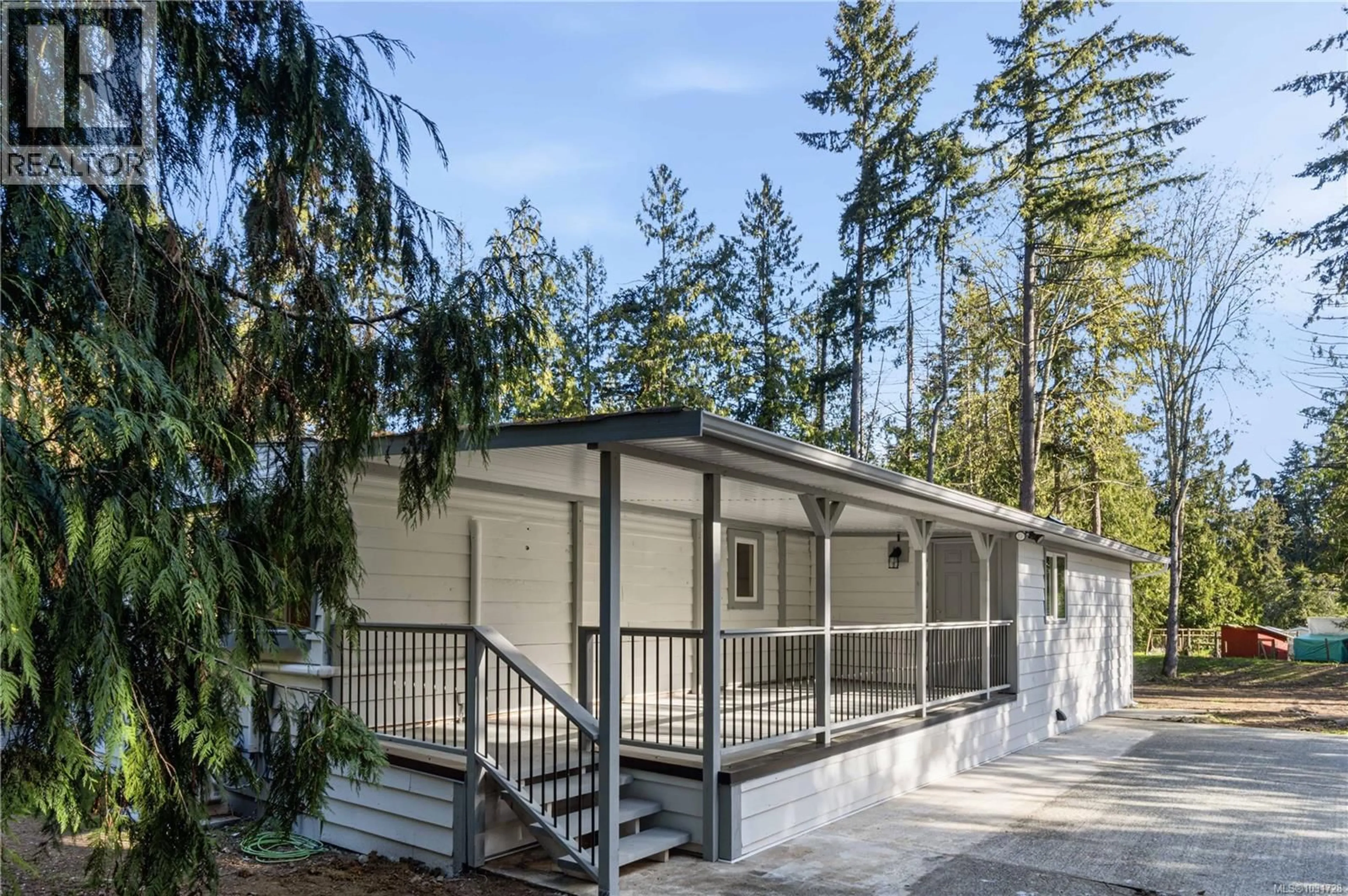 Home with vinyl exterior material, unknown for 1007 FABRICK DRIVE, Qualicum Beach British Columbia V9K1M9