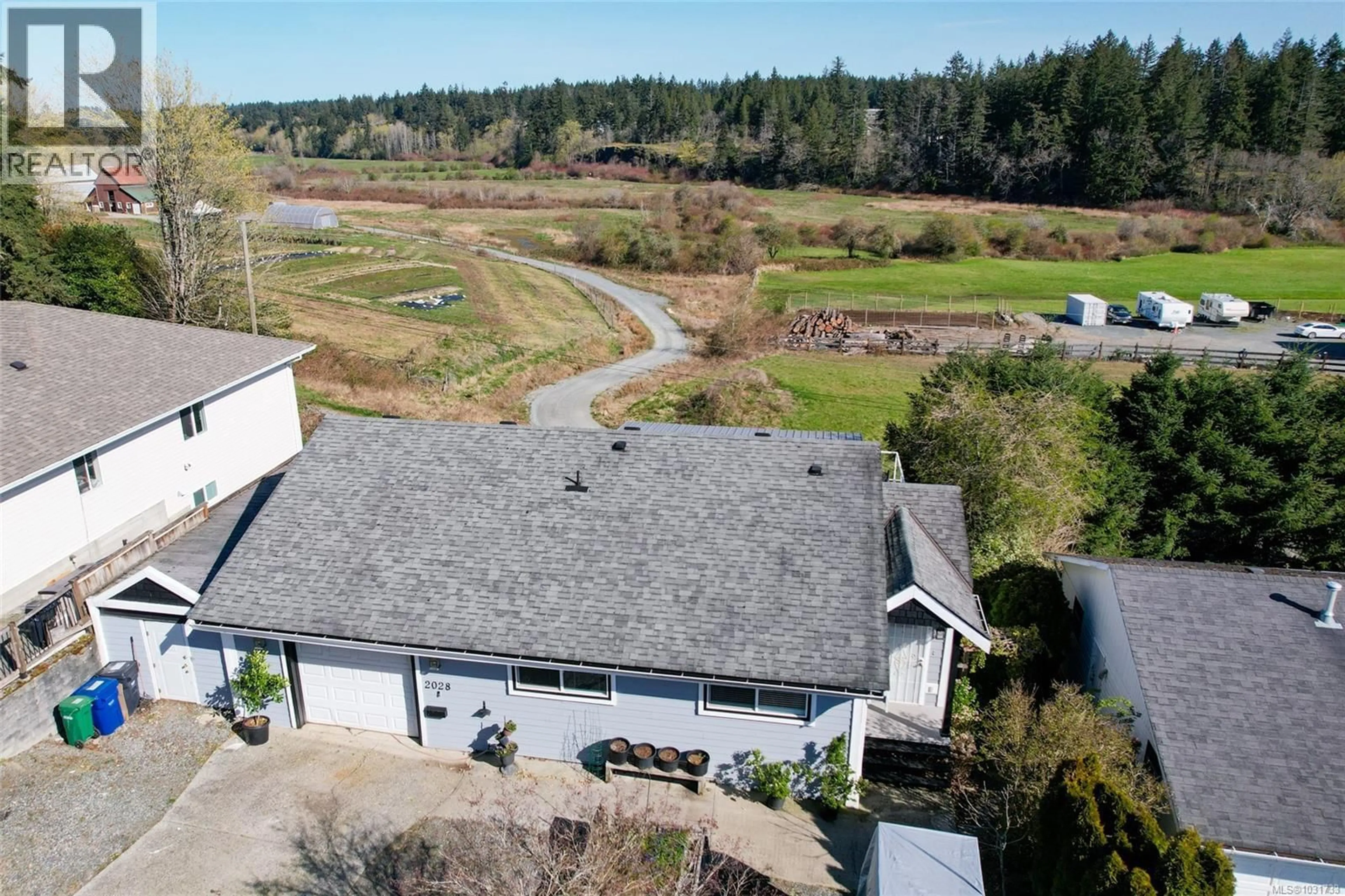 A pic from outside/outdoor area/front of a property/back of a property/a pic from drone, unknown for 2028 CATHERS DRIVE, Nanaimo British Columbia V9R6R9