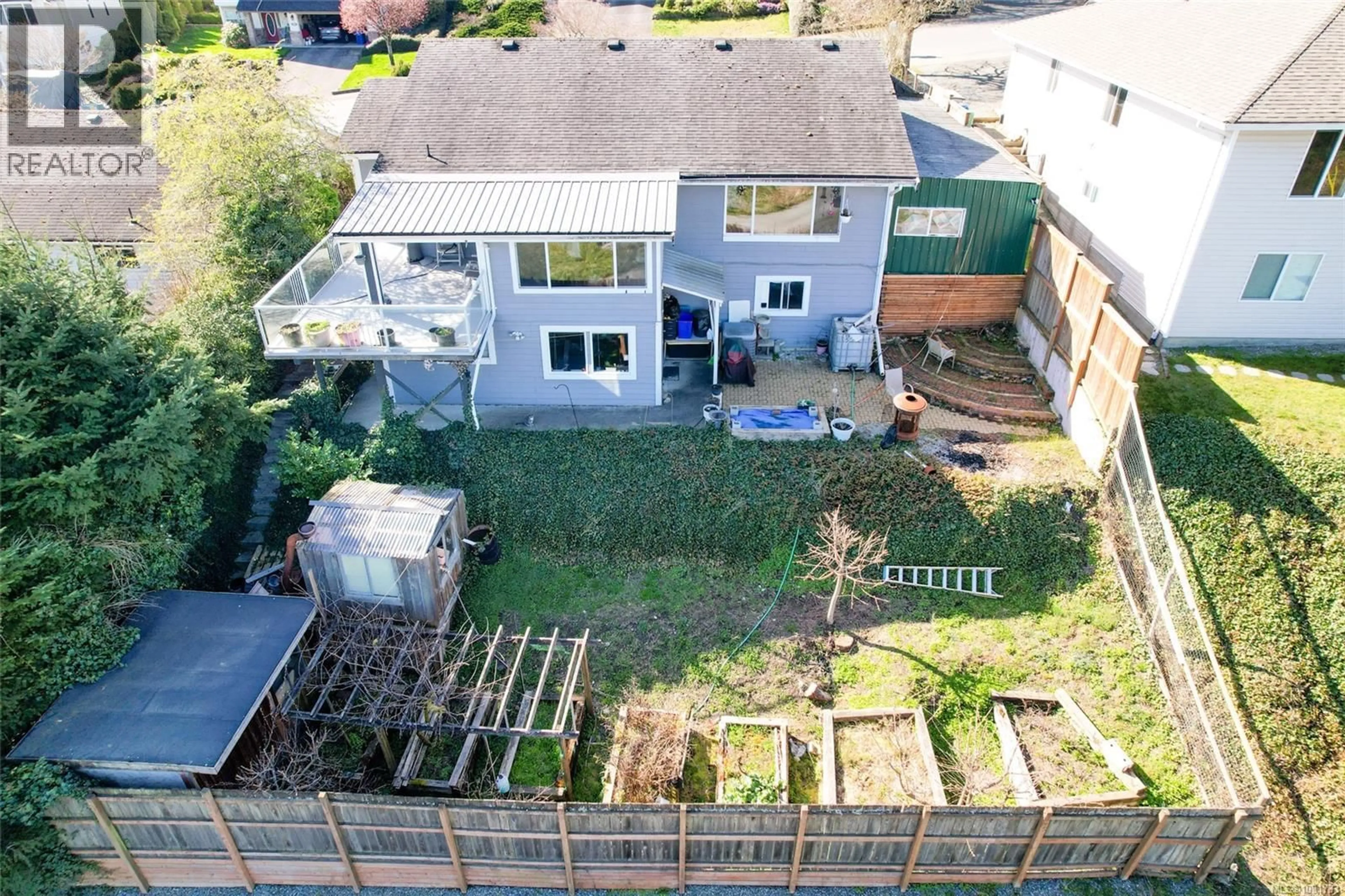 A pic from outside/outdoor area/front of a property/back of a property/a pic from drone, unknown for 2028 CATHERS DRIVE, Nanaimo British Columbia V9R6R9