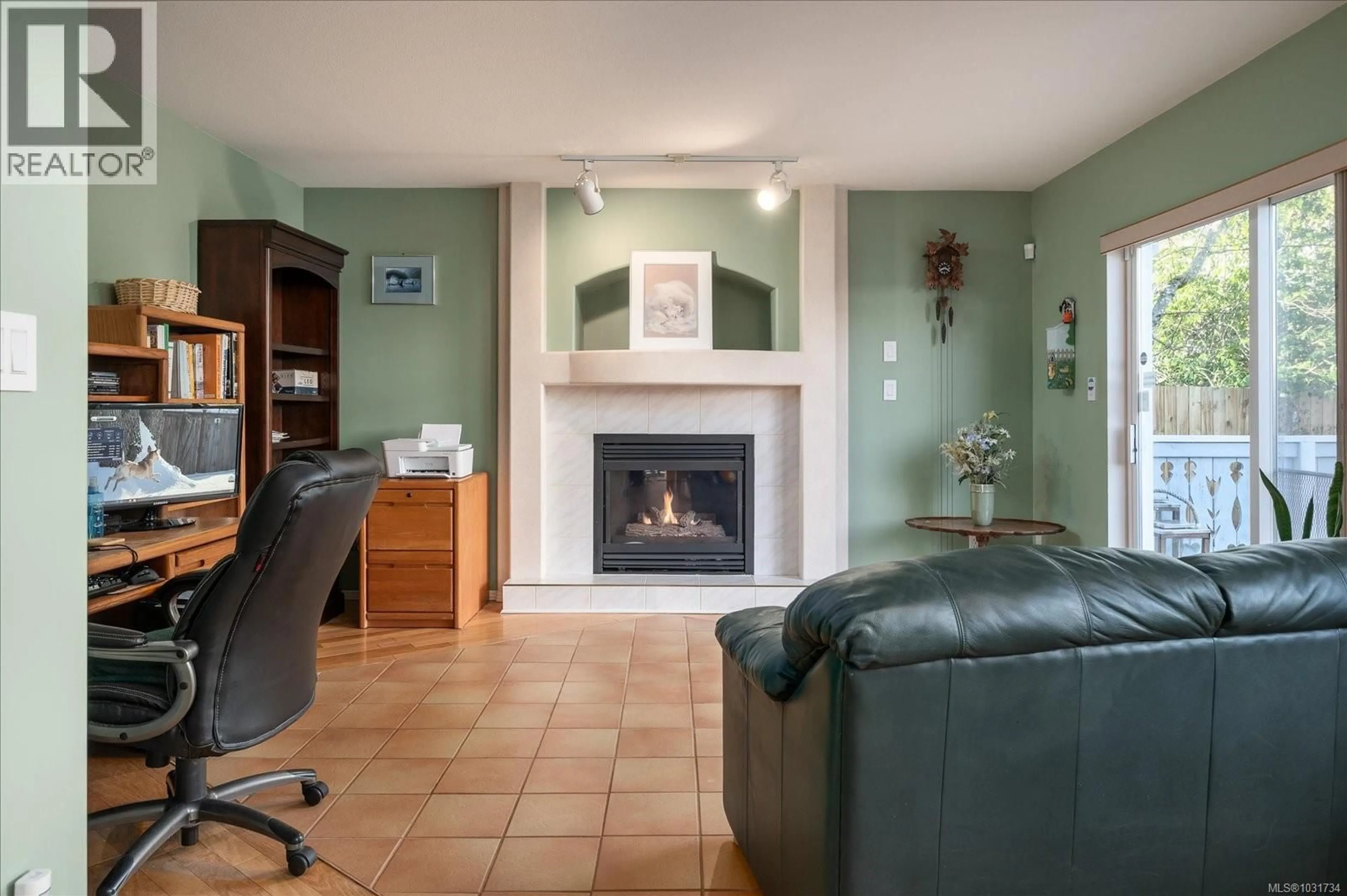 Living room with furniture, ceramic/tile floor for 6642 NATHAN ROAD, Nanaimo British Columbia V9T6H7