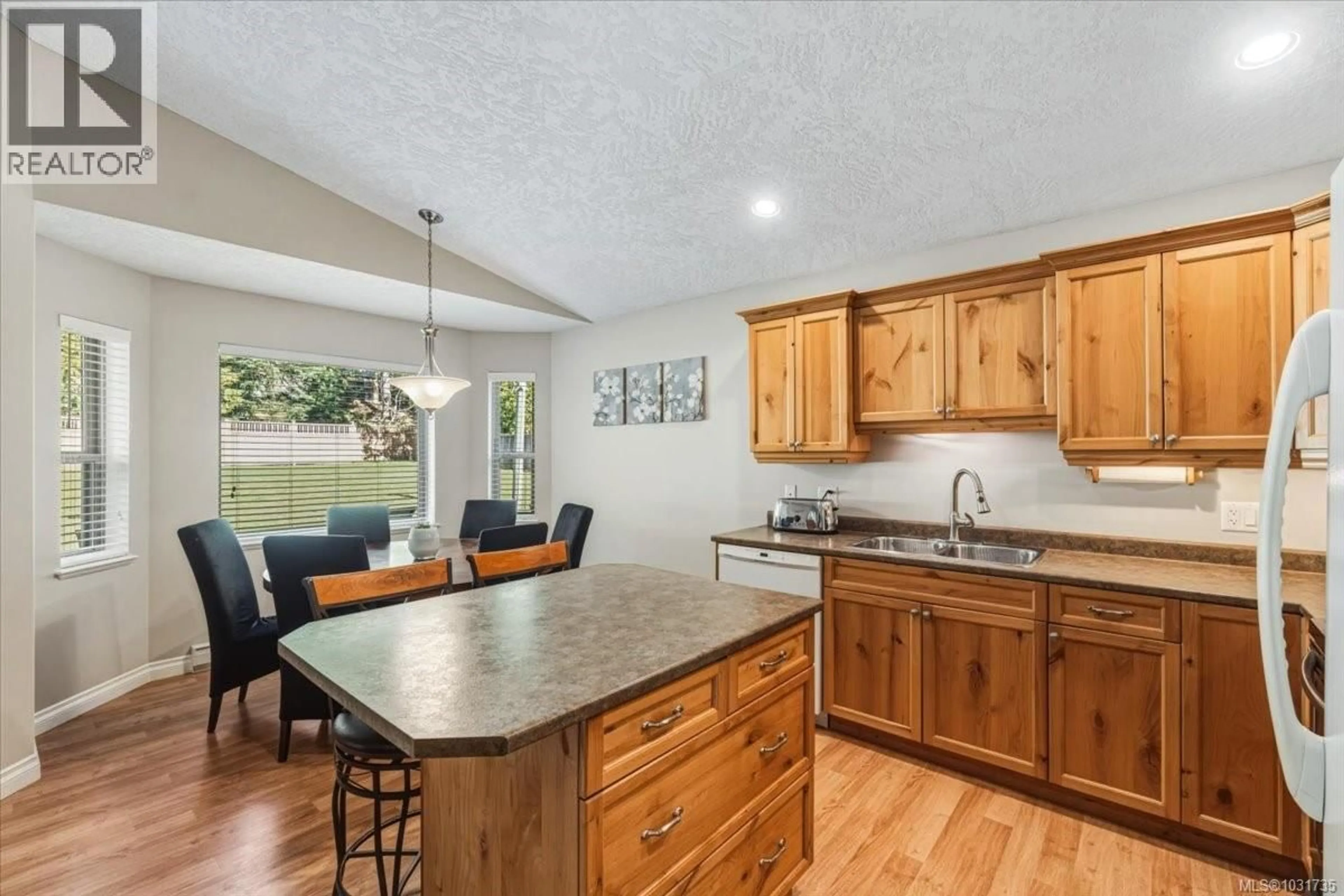 Open concept kitchen, ceramic/tile floor for 1765 CAMERON CRESCENT, Qualicum Beach British Columbia V9K2S3