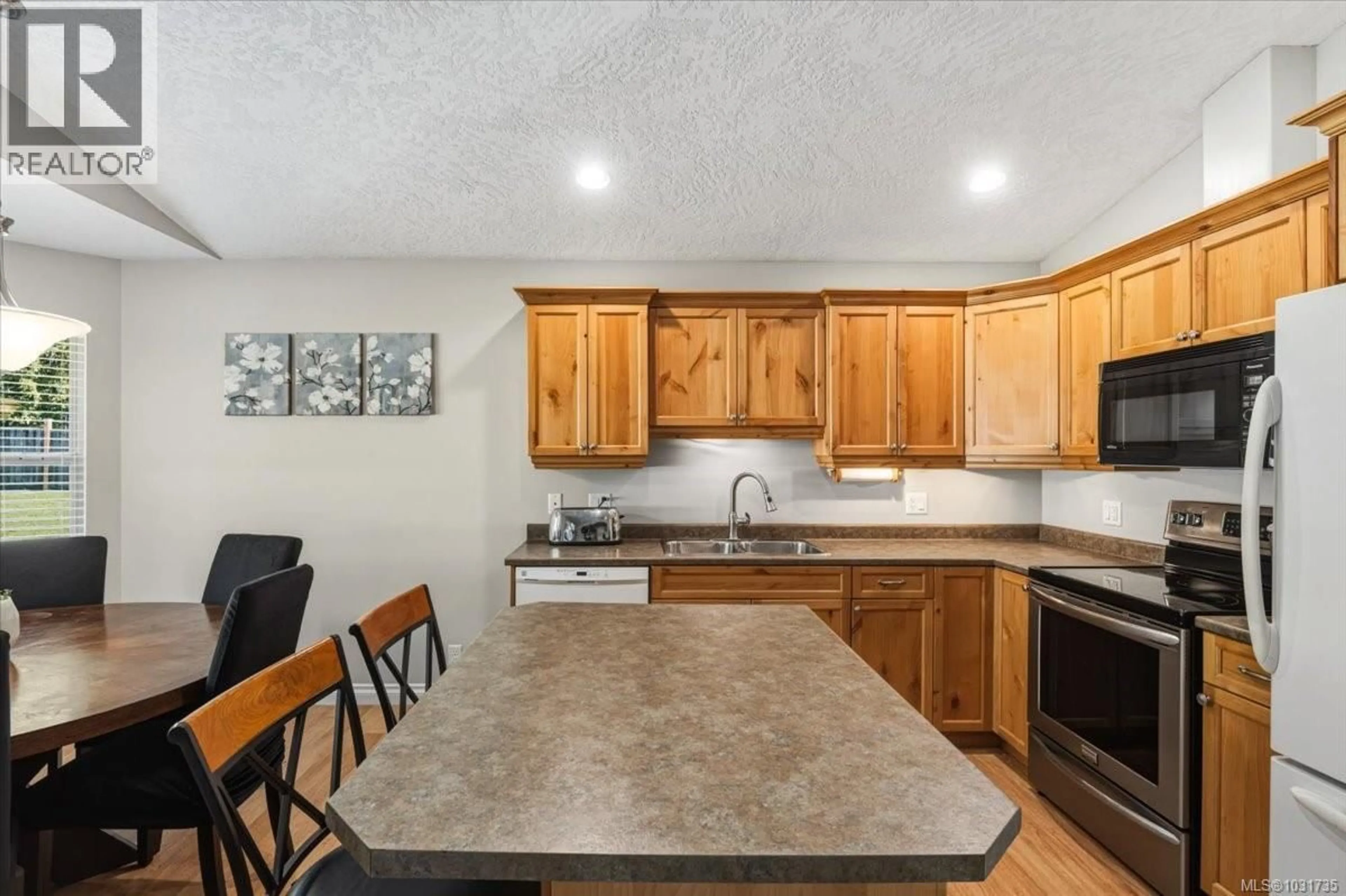 Open concept kitchen, unknown for 1765 CAMERON CRESCENT, Qualicum Beach British Columbia V9K2S3