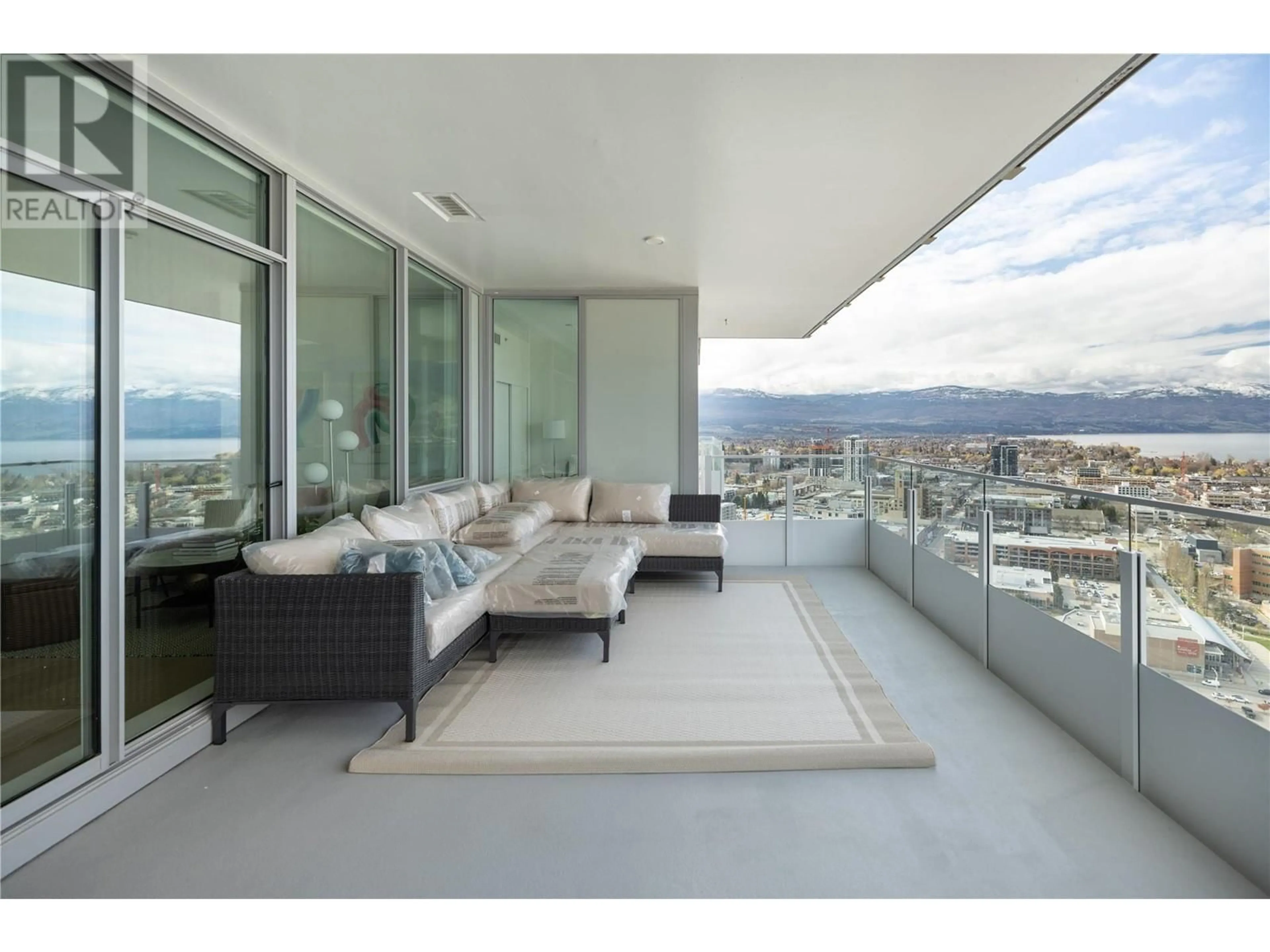 Living room, cement floor for 1191 Sunset Drive Unit# 2904, Kelowna British Columbia V1Y0J4